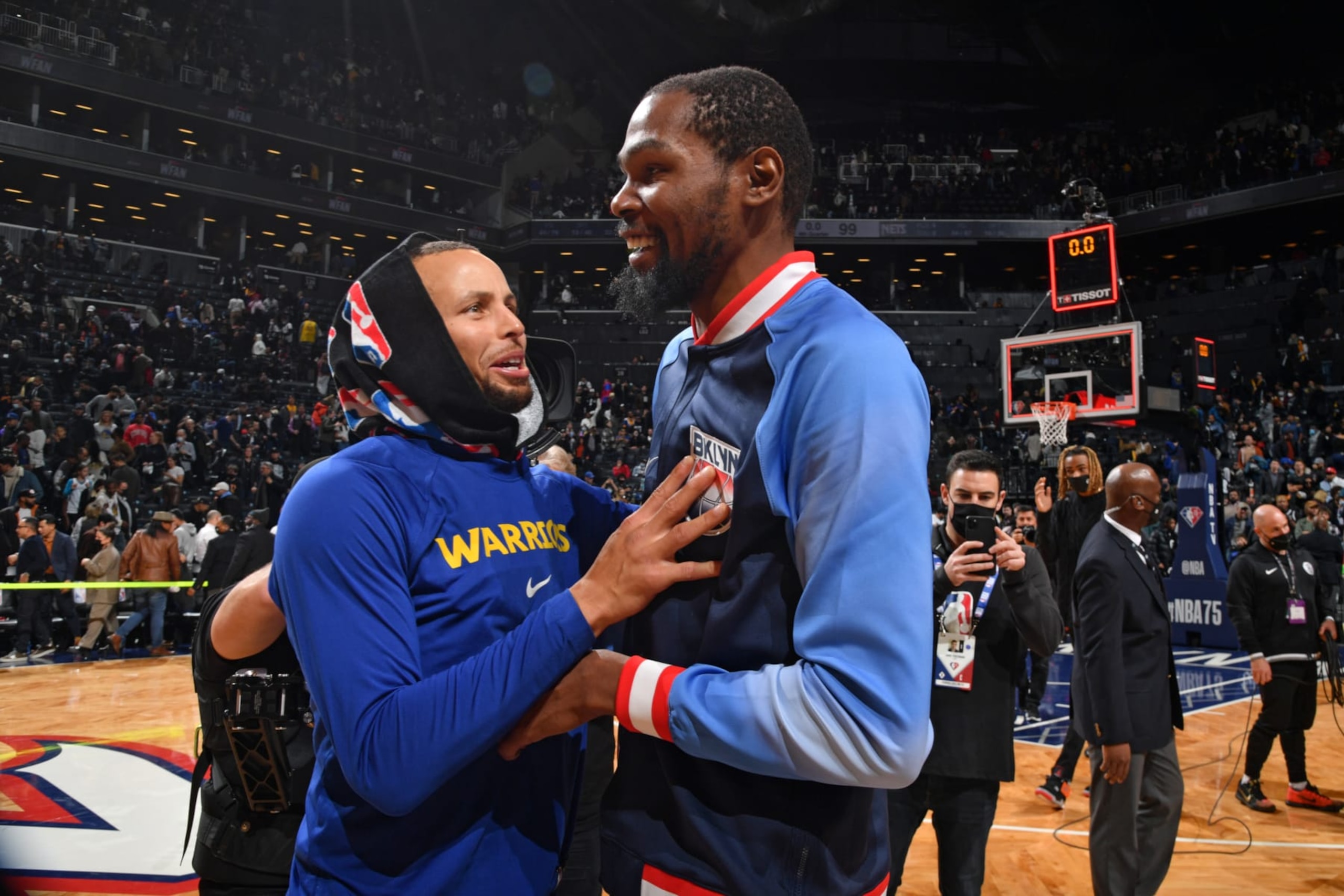 BROOKLYN, NY - NOVEMBER 16: Stephen Curry #30 of the Golden State Warriors and Kevin Durant #7 of the Brooklyn Nets talk after a game on November 16, 2021 at Barclays Center in Brooklyn, New York. NOTE TO USER: User expressly acknowledges and agrees that, by downloading and/or using this Photograph, user is consenting to the terms and conditions of the Getty Images License Agreement. Mandatory Copyright Notice: Copyright 2021 NBAE (Photo by Jesse D. Garrabrant/NBAE via Getty Images)