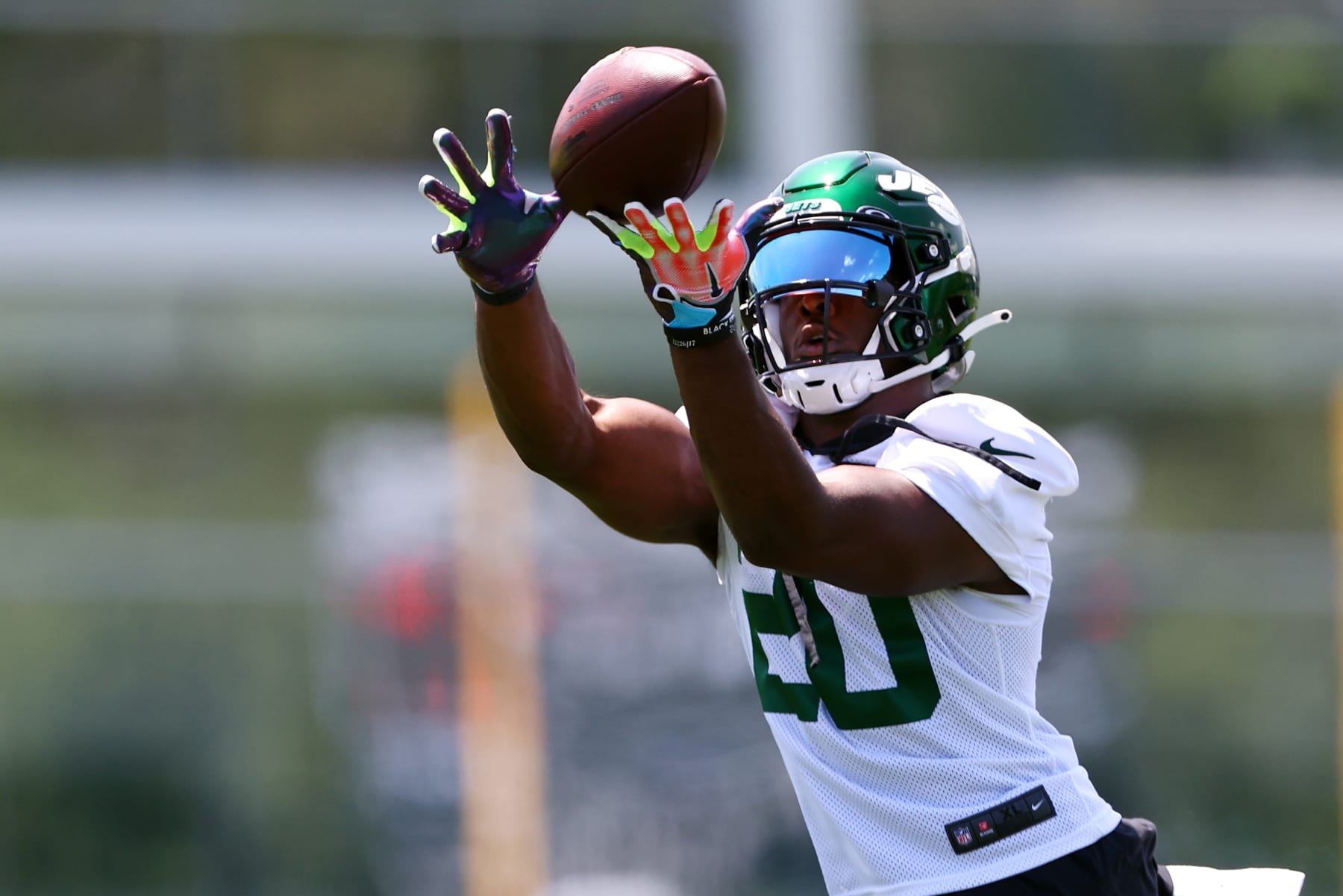 FLORHAM PARK, NJ - JUNE 15: Running Back Breece Hall #20 of the New York Jets catches a pass during New York Jets mandatory minicamp at Atlantic Health Jets Training Center on June 15, 2022 in Florham Park, New Jersey. (Photo by Rich Schultz/Getty Images)