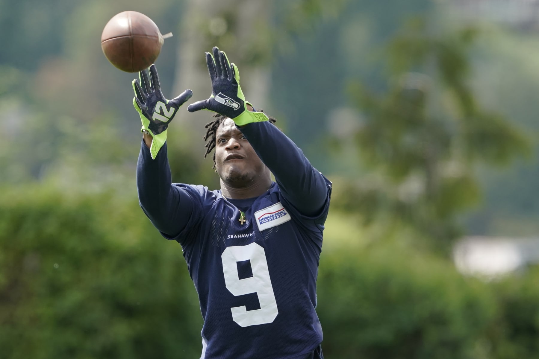 Seattle Seahawks running back Kenneth Walker makes a catch while working on extra drills following NFL football practice Wednesday, June 8, 2022, in Renton, Wash. (AP Photo/Ted S. Warren)