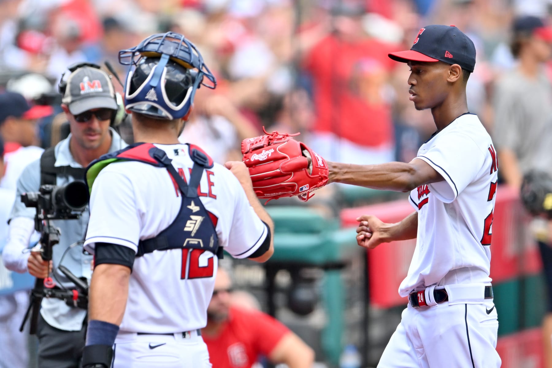 CLEVELAND, OHIO - AUGUST 07: Catcher Luke Maile #12 and Starting pitcher Triston McKenzie #24 of the Cleveland Guardians celebrate after the first inning against the Houston Astros at Progressive Field on August 07, 2022 in Cleveland, Ohio. (Photo by Jason Miller/Getty Images)