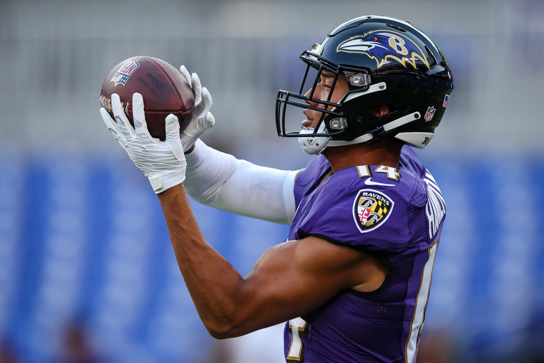 BALTIMORE, MD - AUGUST 11: Kyle Hamilton #14 of the Baltimore Ravens warms up before the game against the Tennessee Titans at M&T Bank Stadium on August 11, 2022 in Baltimore, Maryland. (Photo by Scott Taetsch/Getty Images)