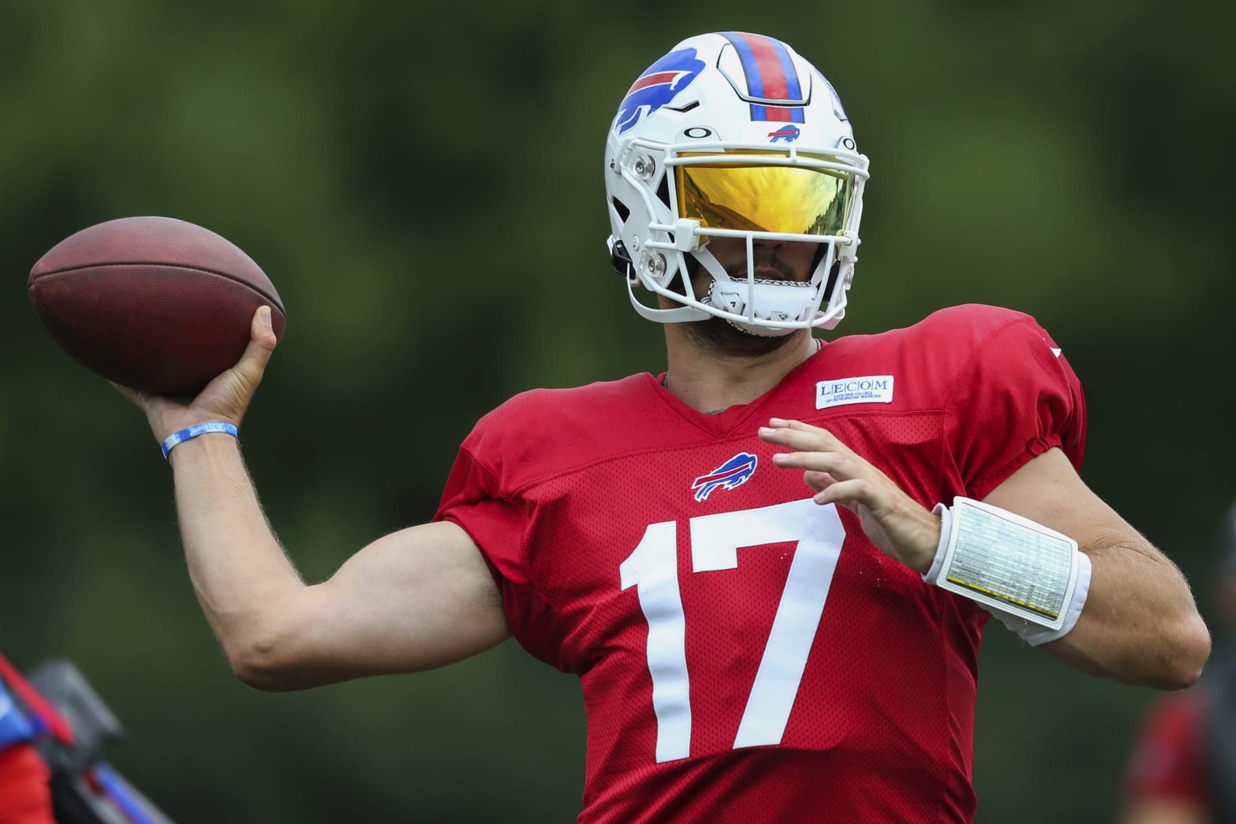 Buffalo Bills quarterback Josh Allen (17) throws during practice at the NFL football team's training camp in Pittsford, N.Y., Thursday, Aug. 4, 2022. (AP Photo/Joshua Bessex)