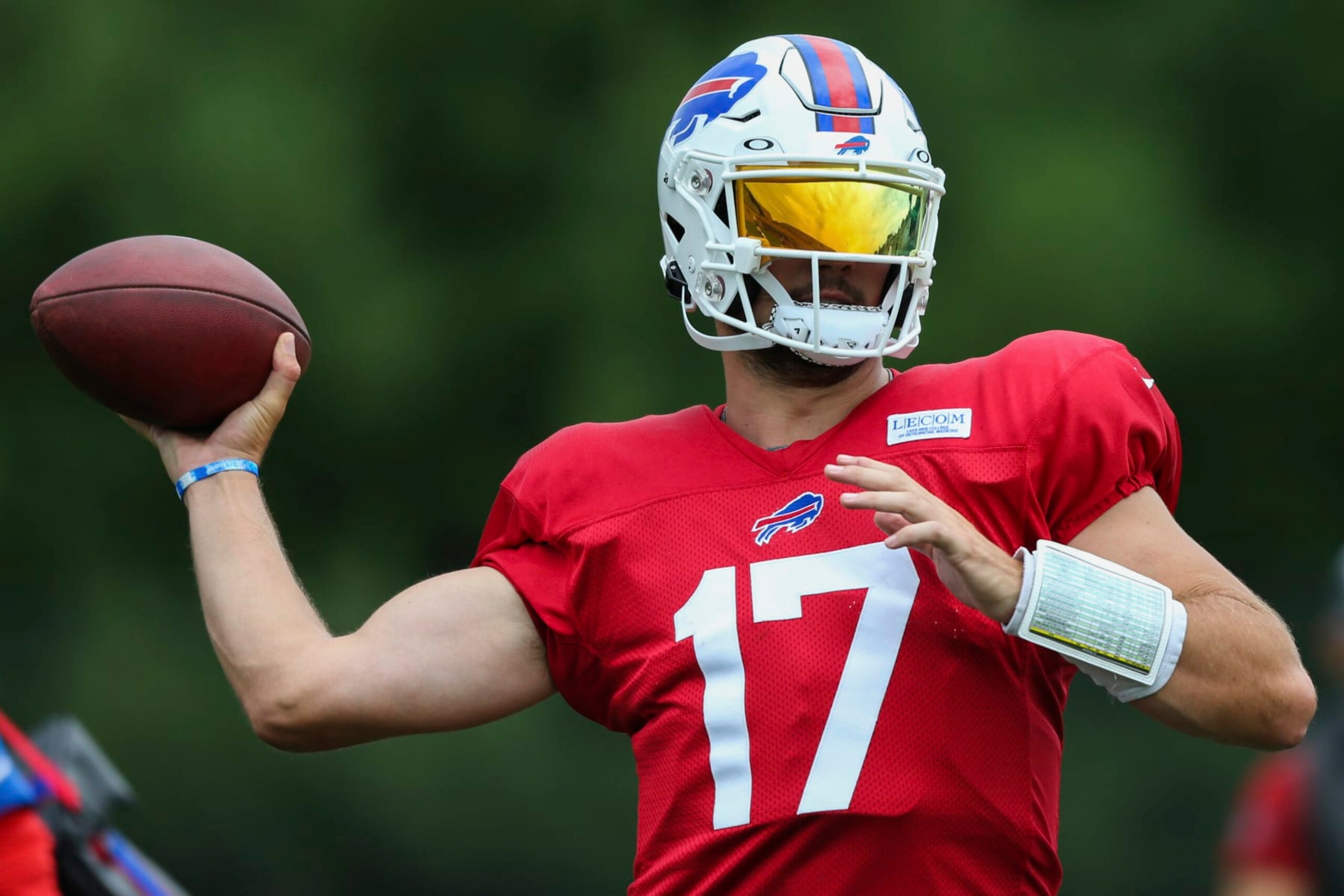 Buffalo Bills quarterback Josh Allen (17) throws during practice at the NFL football team's training camp in Pittsford, N.Y., Thursday, Aug. 4, 2022. (AP Photo/Joshua Bessex) Buffalo Bills quarterback Josh Allen (17) throws during practice at the NFL football team's training camp in Pittsford, N.Y., Thursday, Aug. 4, 2022. (AP Photo/Joshua Bessex)