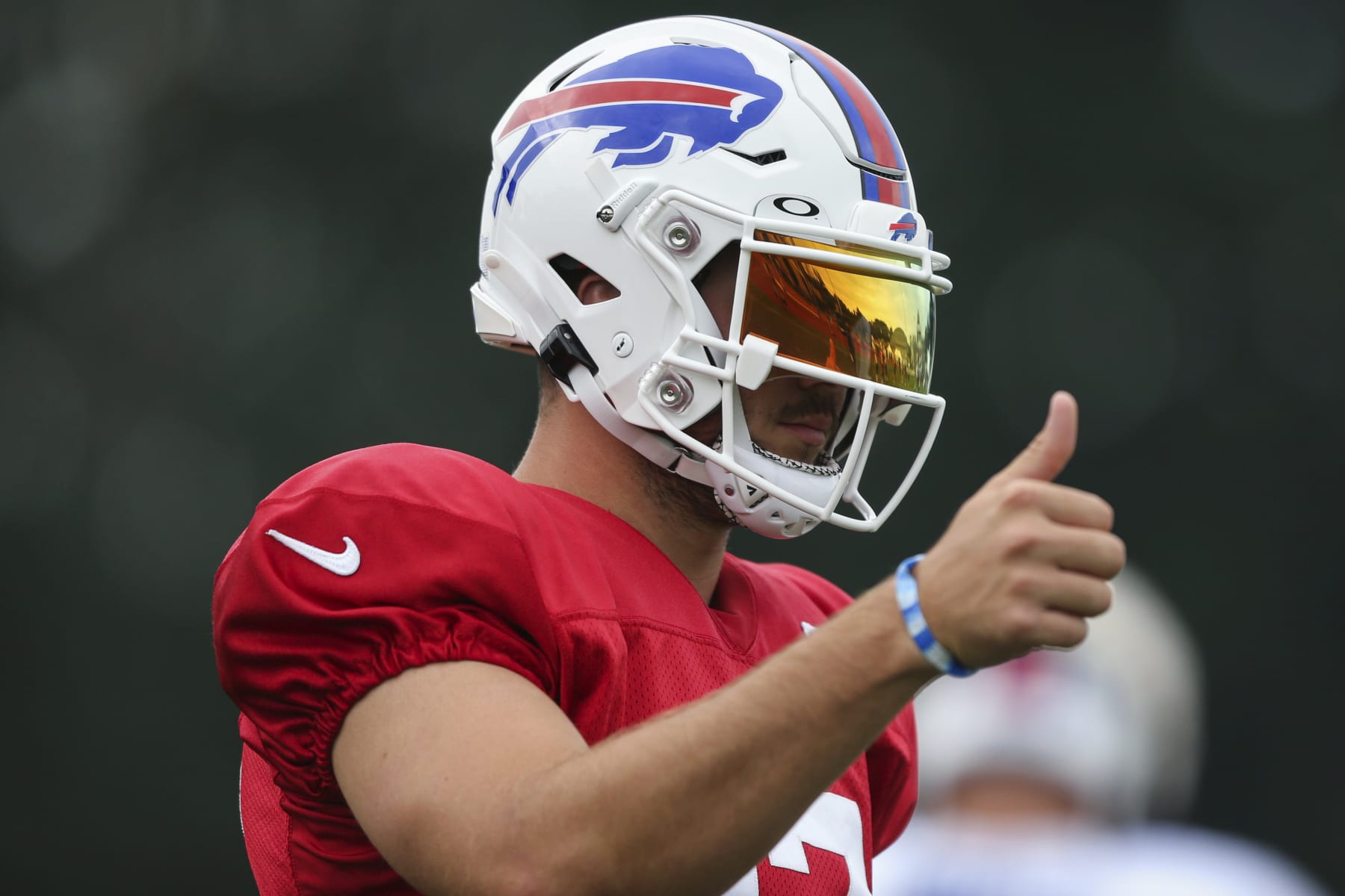 Buffalo Bills quarterback Josh Allen (17) gives a thumbs up during practice at the NFL football team's training camp in Pittsford, N.Y., Thursday, Aug. 4, 2022. (AP Photo/Joshua Bessex)