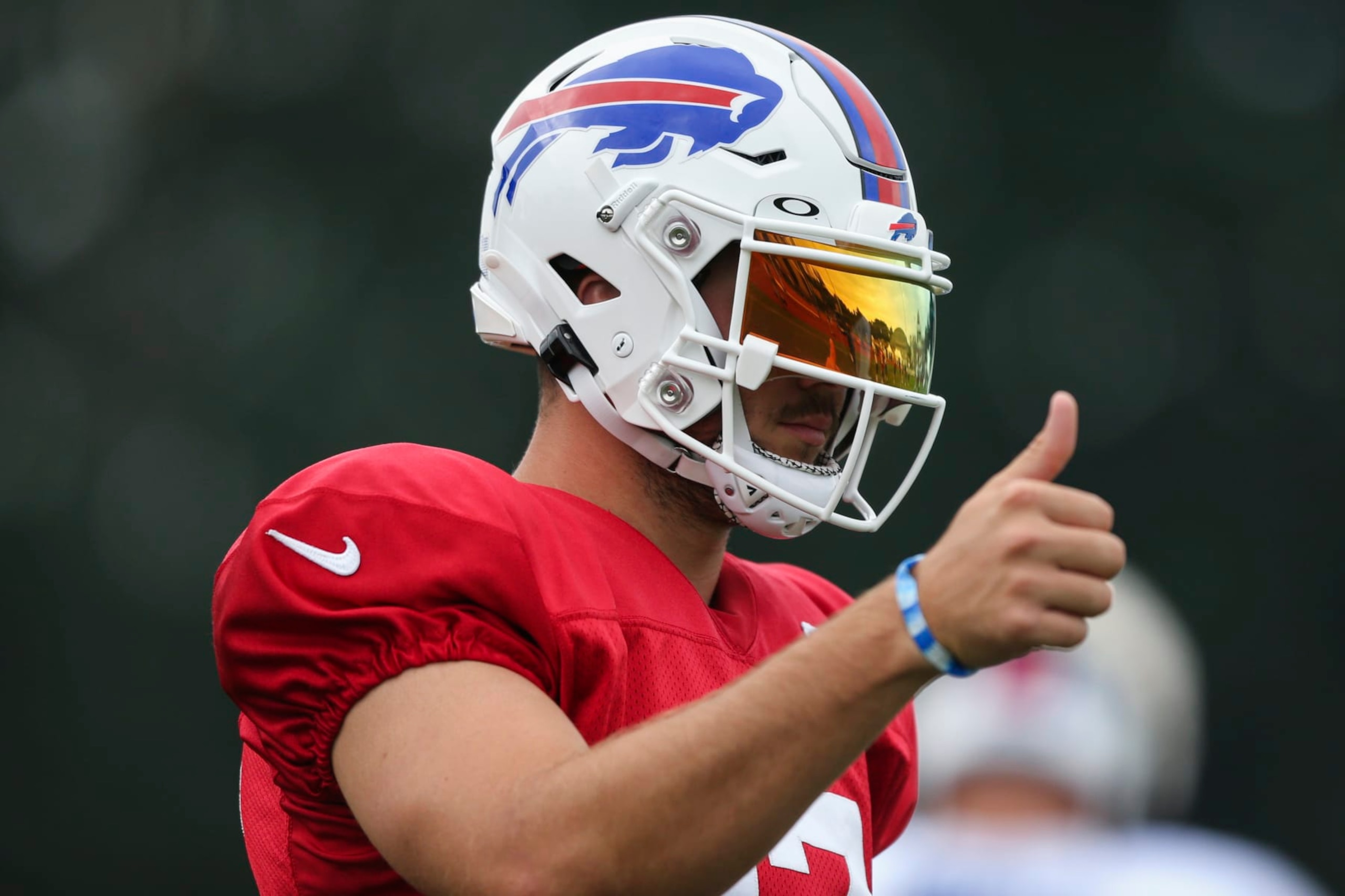 Buffalo Bills quarterback Josh Allen (17) gives a thumbs up during practice at the NFL football team's training camp in Pittsford, N.Y., Thursday, Aug. 4, 2022. (AP Photo/Joshua Bessex)