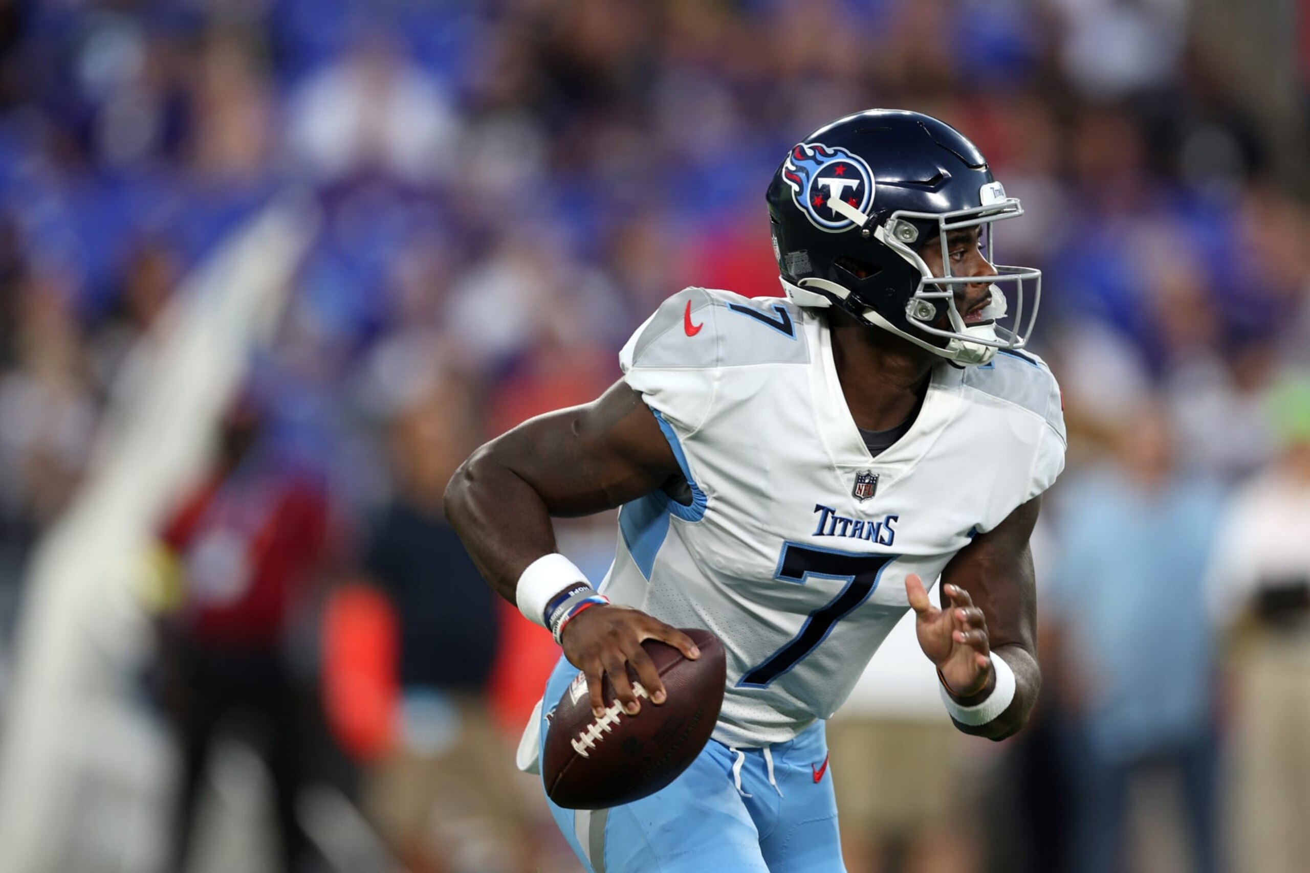 BALTIMORE, MARYLAND - AUGUST 11: Quarterback Malik Willis #7 of the Tennessee Titans rolls out to pass against the Baltimore Ravens in the first half at M&T Bank Stadium on August 11, 2022 in Baltimore, Maryland. (Photo by Rob Carr/Getty Images) BALTIMORE, MARYLAND - AUGUST 11: Quarterback Malik Willis #7 of the Tennessee Titans rolls out to pass against the Baltimore Ravens in the first half at M&T Bank Stadium on August 11, 2022 in Baltimore, Maryland. (Photo by Rob Carr/Getty Images)