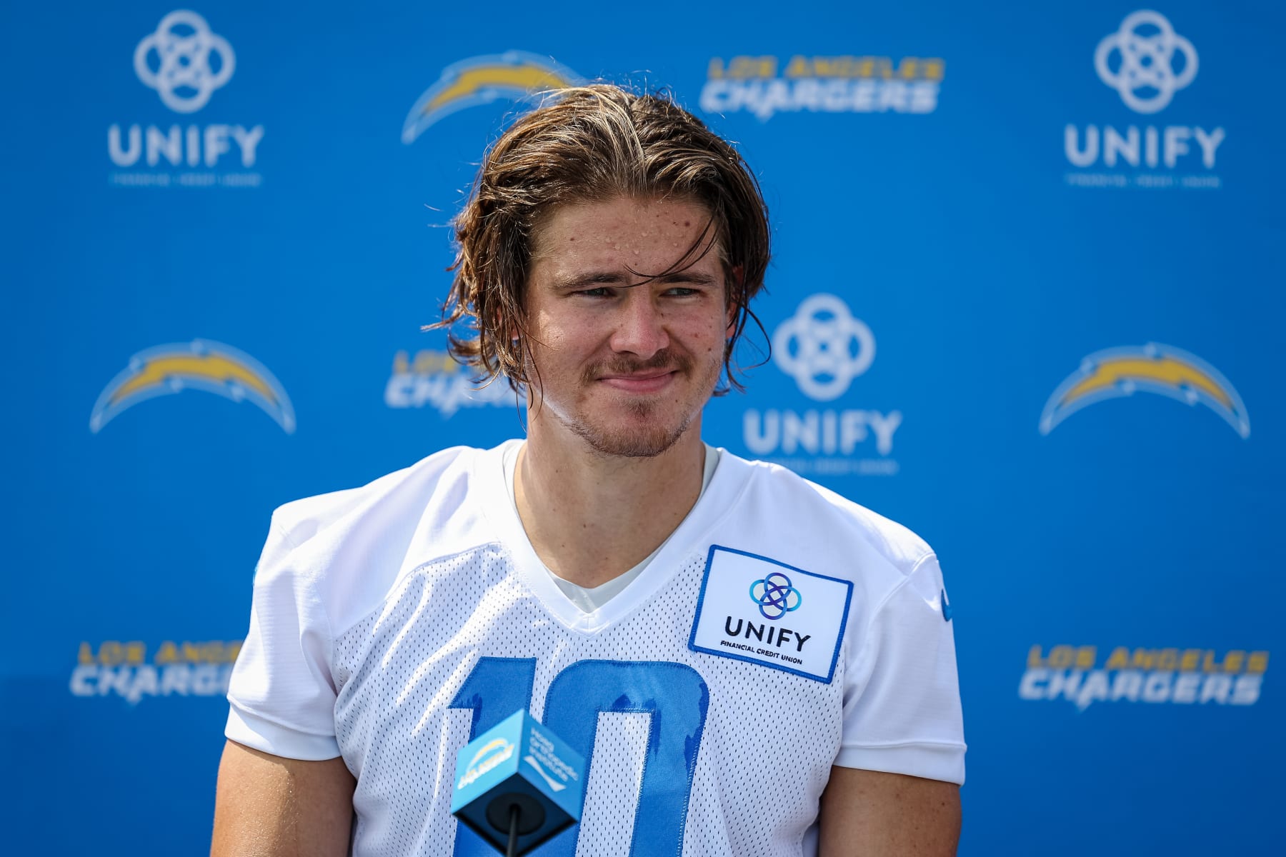 COSTA MESA, CA - JULY 27: Justin Herbert #10 of the Los Angeles Charger speaks with the media during training camp at Jack Hammett Sports Complex on July 27, 2022 in Costa Mesa, California. (Photo by Scott Taetsch/Getty Images)