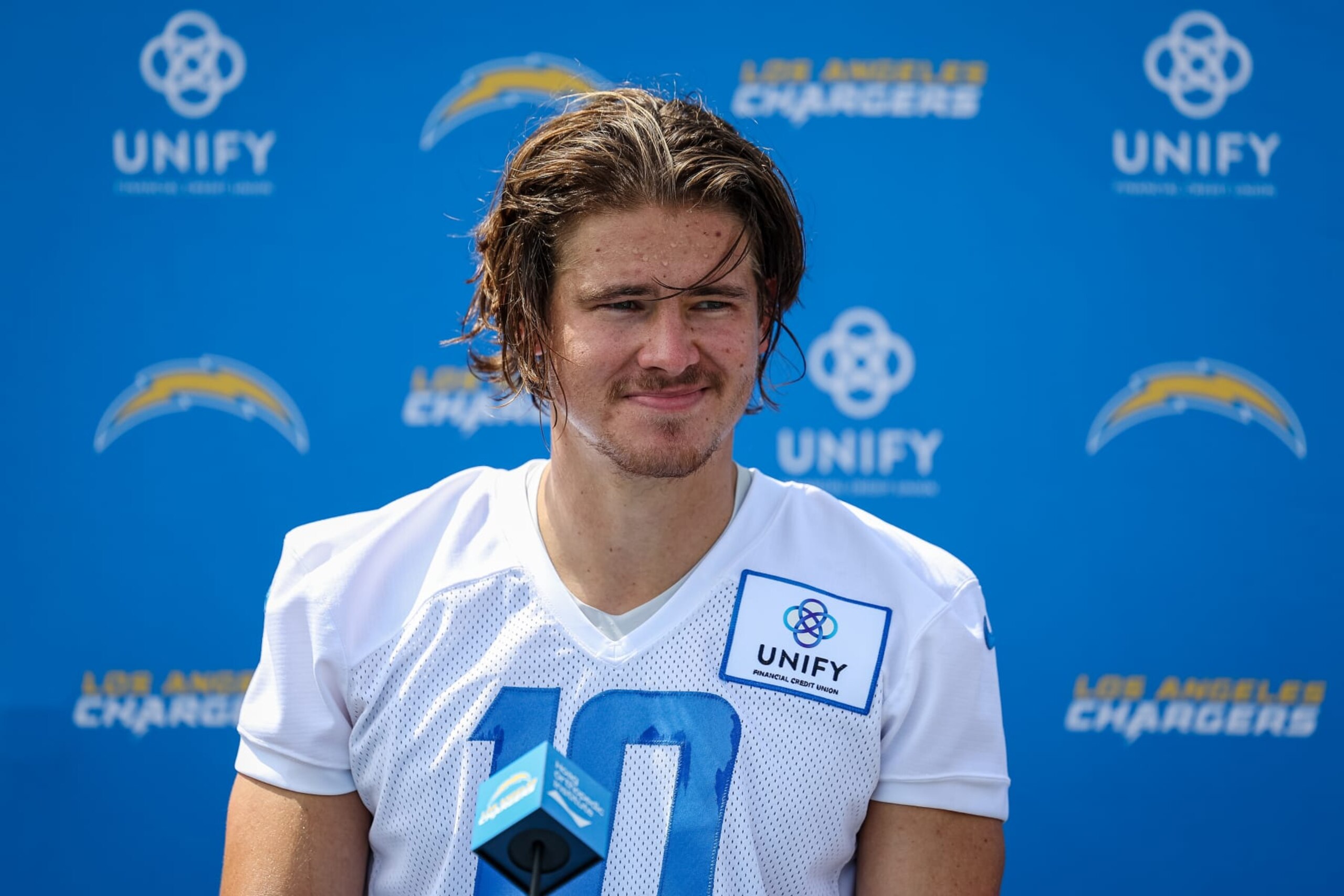 COSTA MESA, CA - JULY 27: Justin Herbert #10 of the Los Angeles Charger speaks with the media during training camp at Jack Hammett Sports Complex on July 27, 2022 in Costa Mesa, California. (Photo by Scott Taetsch/Getty Images)