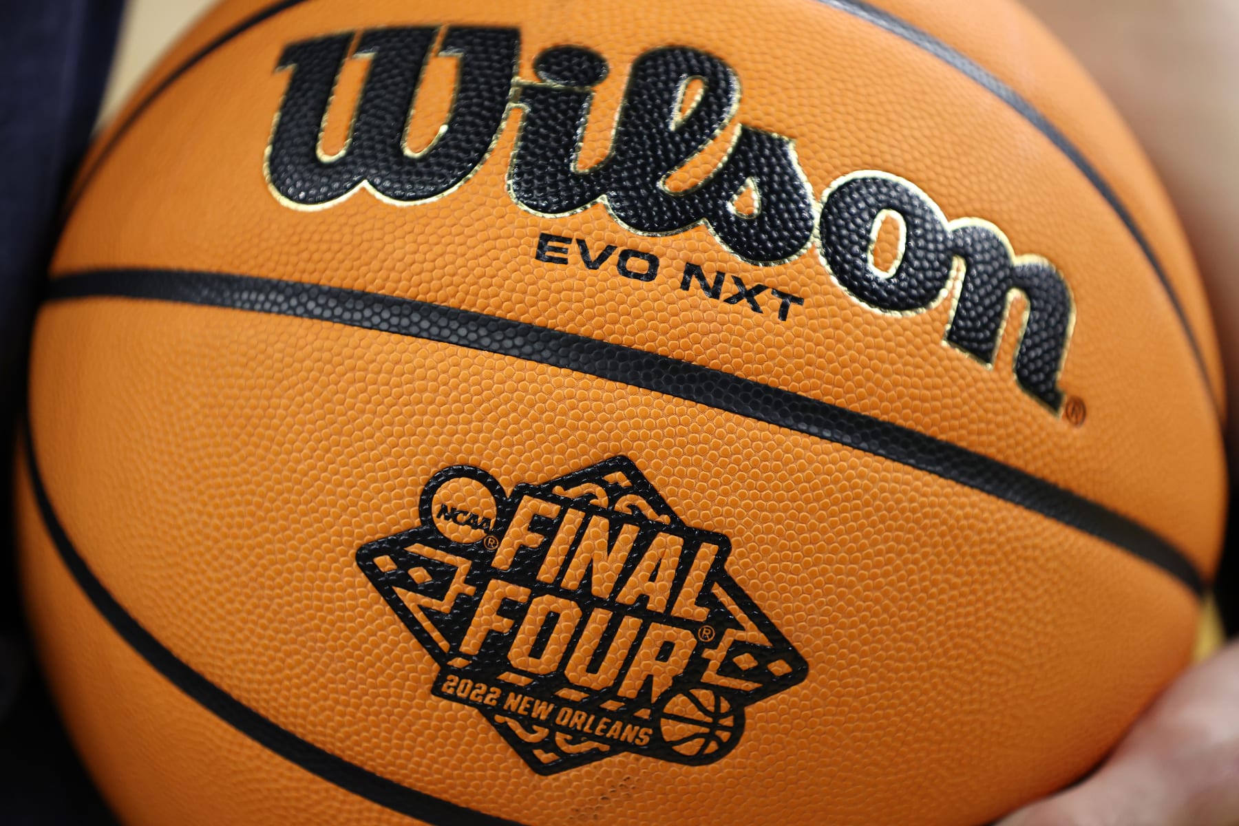 NEW ORLEANS, LOUISIANA - APRIL 02: The logo for the 2022 NCAA Men's Basketball Tournament Final Four semifinal is seen on a basketball before the game between the Villanova Wildcats and the Kansas Jayhawks at Caesars Superdome on April 02, 2022 in New Orleans, Louisiana. (Photo by Jamie Squire/Getty Images)