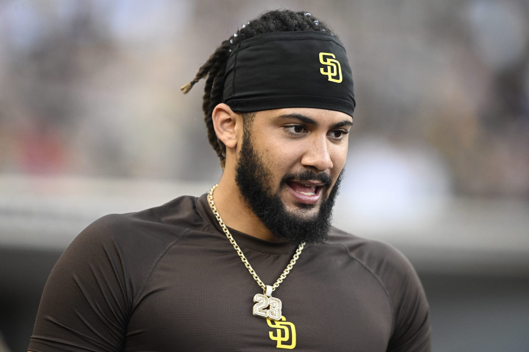SAN DIEGO, CA - JUNE 23: Fernando Tatis Jr. #23 of the San Diego Padres looks on  during a baseball game against the Philadelphia Phillies June 23, 2022 at Petco Park in San Diego, California. (Photo by Denis Poroy/Getty Images)