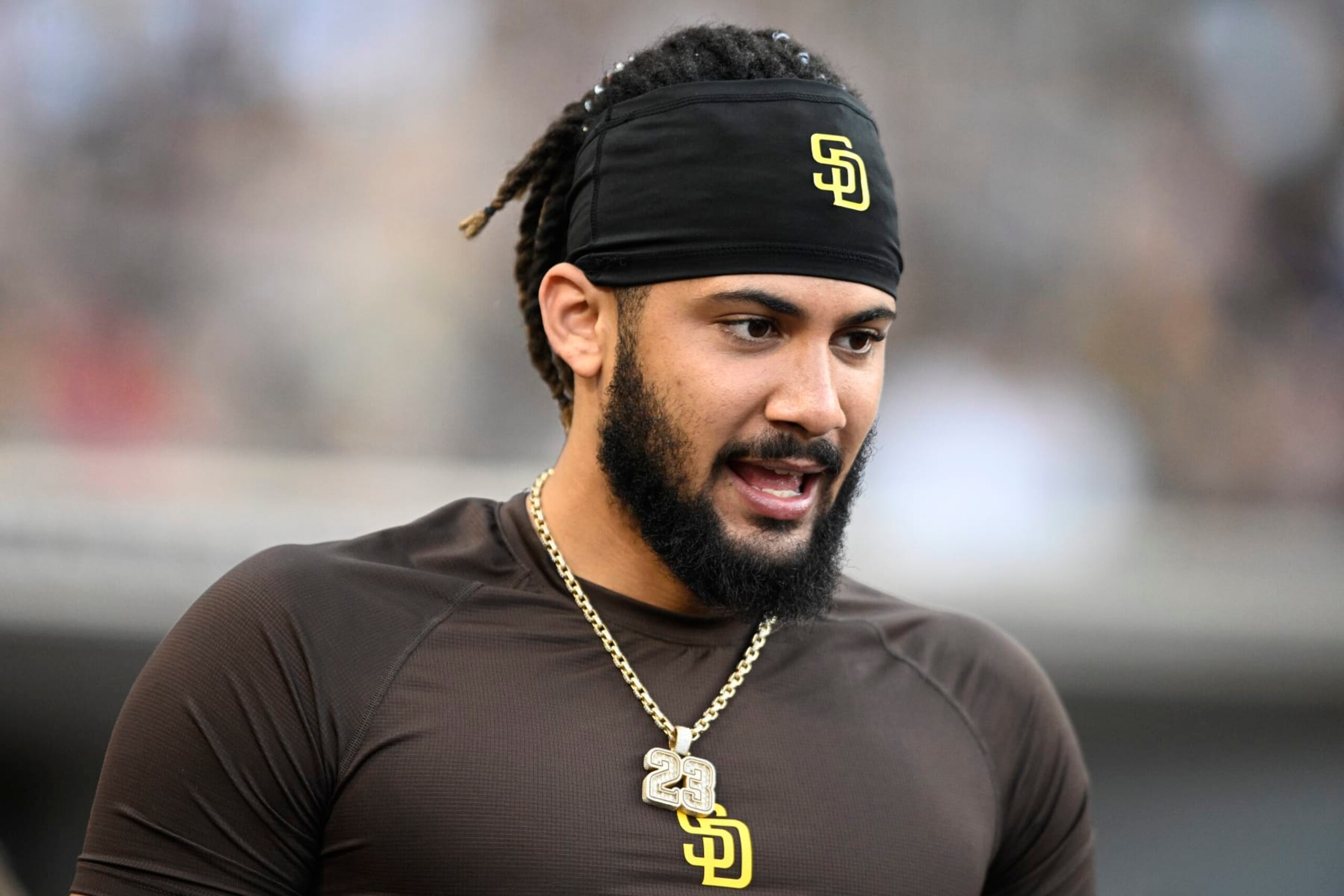 SAN DIEGO, CA - JUNE 23: Fernando Tatis Jr. #23 of the San Diego Padres looks on  during a baseball game against the Philadelphia Phillies June 23, 2022 at Petco Park in San Diego, California. (Photo by Denis Poroy/Getty Images)