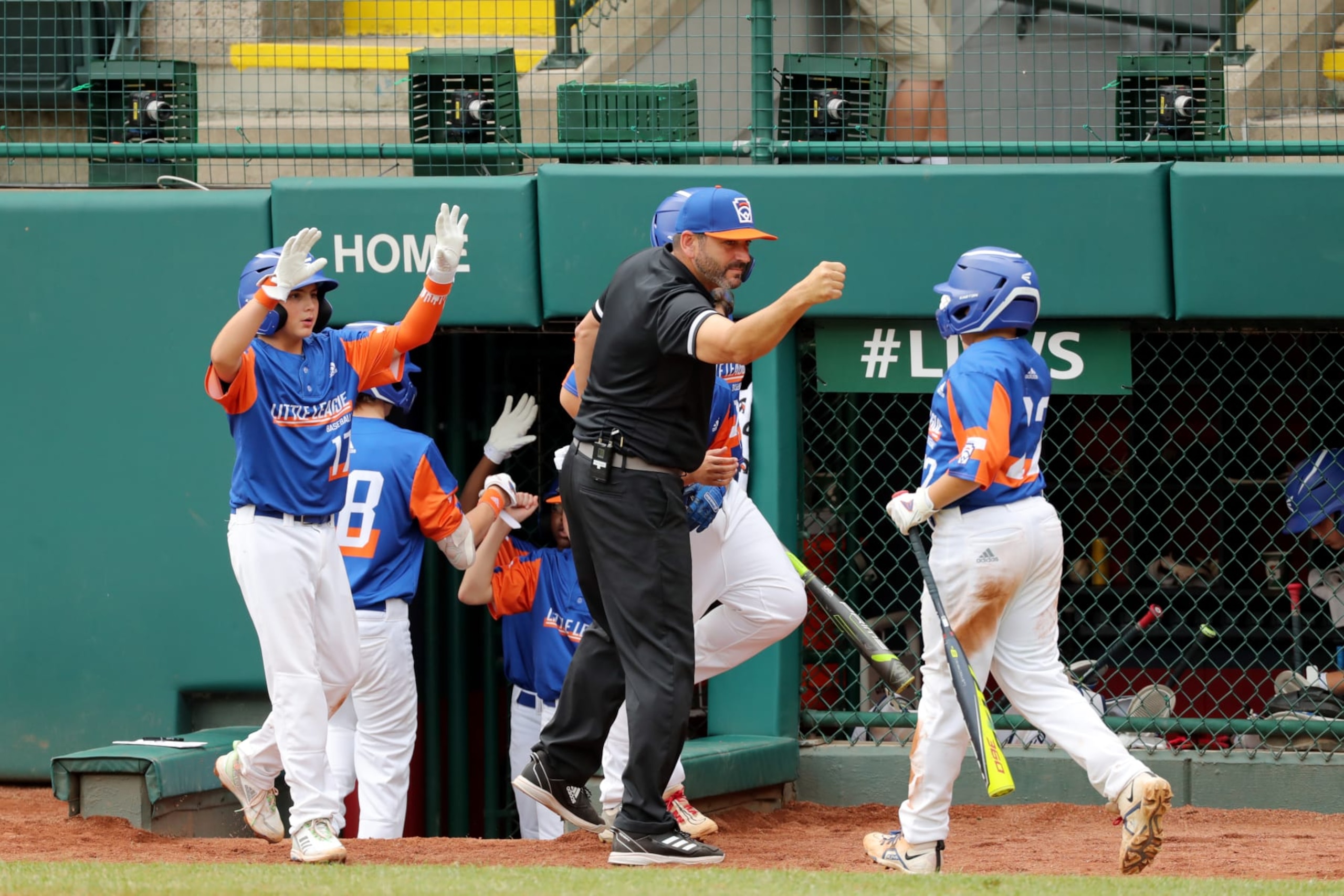 SOUTH WILLIAMSPORT, PA - AUGUST 29:  Members of Team Michigan celebrate against Team Ohio during the 2021 Little League World Series at Howard J Lamade Stadium on Sunday, August 29, 2021 in South Williamsport, Pennsylvania. (Photo by Hunter Martin/MLB Photos via Getty Images)