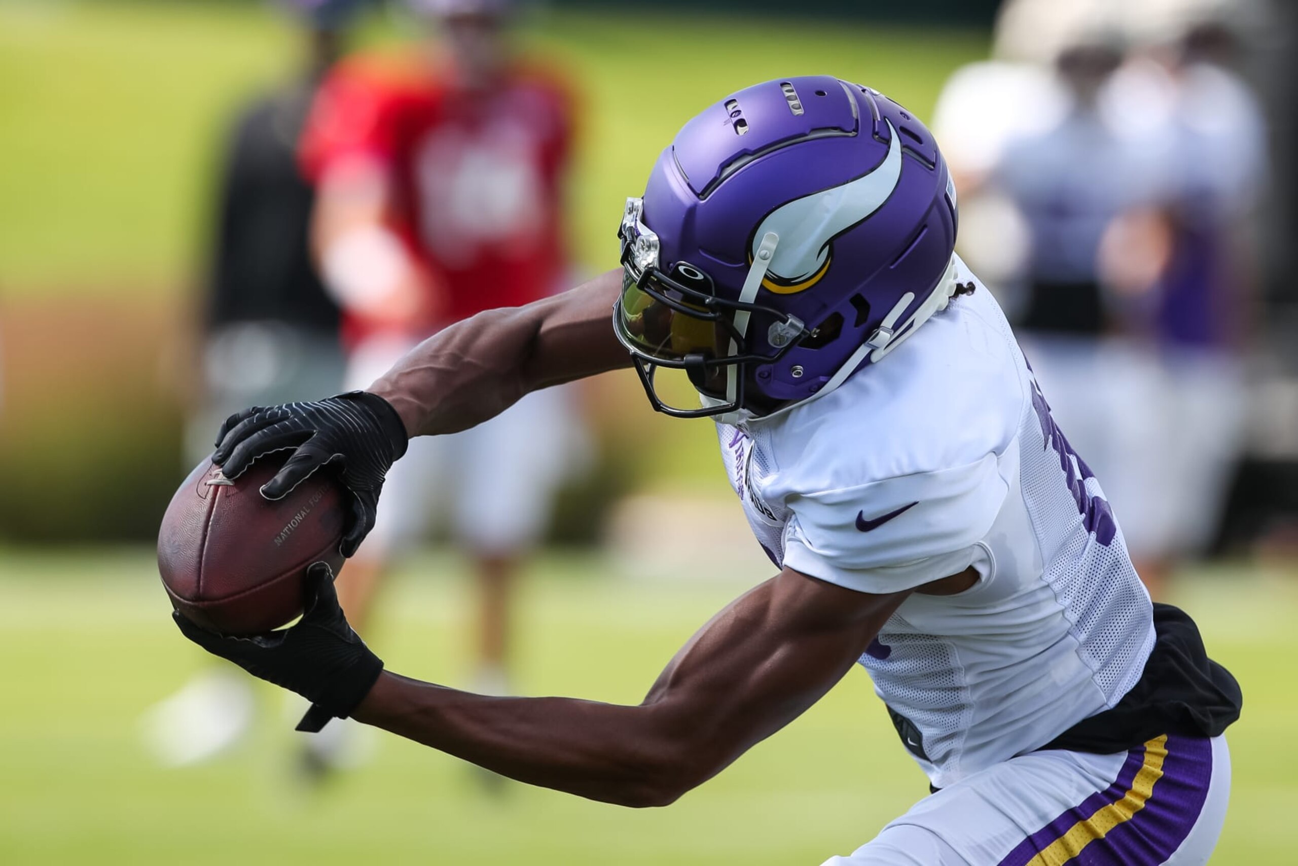 EAGAN, MN - AUGUST 11: Justin Jefferson #18 of the Minnesota Vikings catches a pass during training camp at TCO Performance Center on August 11, 2022 in Eagan, Minnesota. (Photo by David Berding/Getty Images)