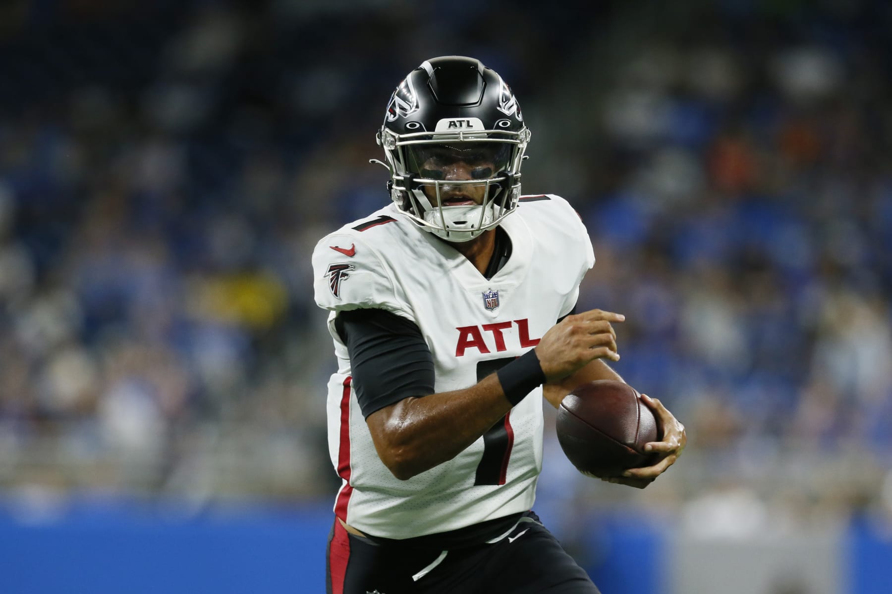 Atlanta Falcons quarterback Marcus Mariota runs for a 6-yard touchdown during the first half of a preseason NFL football game against the Detroit Lions, Friday, Aug. 12, 2022, in Detroit. (AP Photo/Duane Burleson)