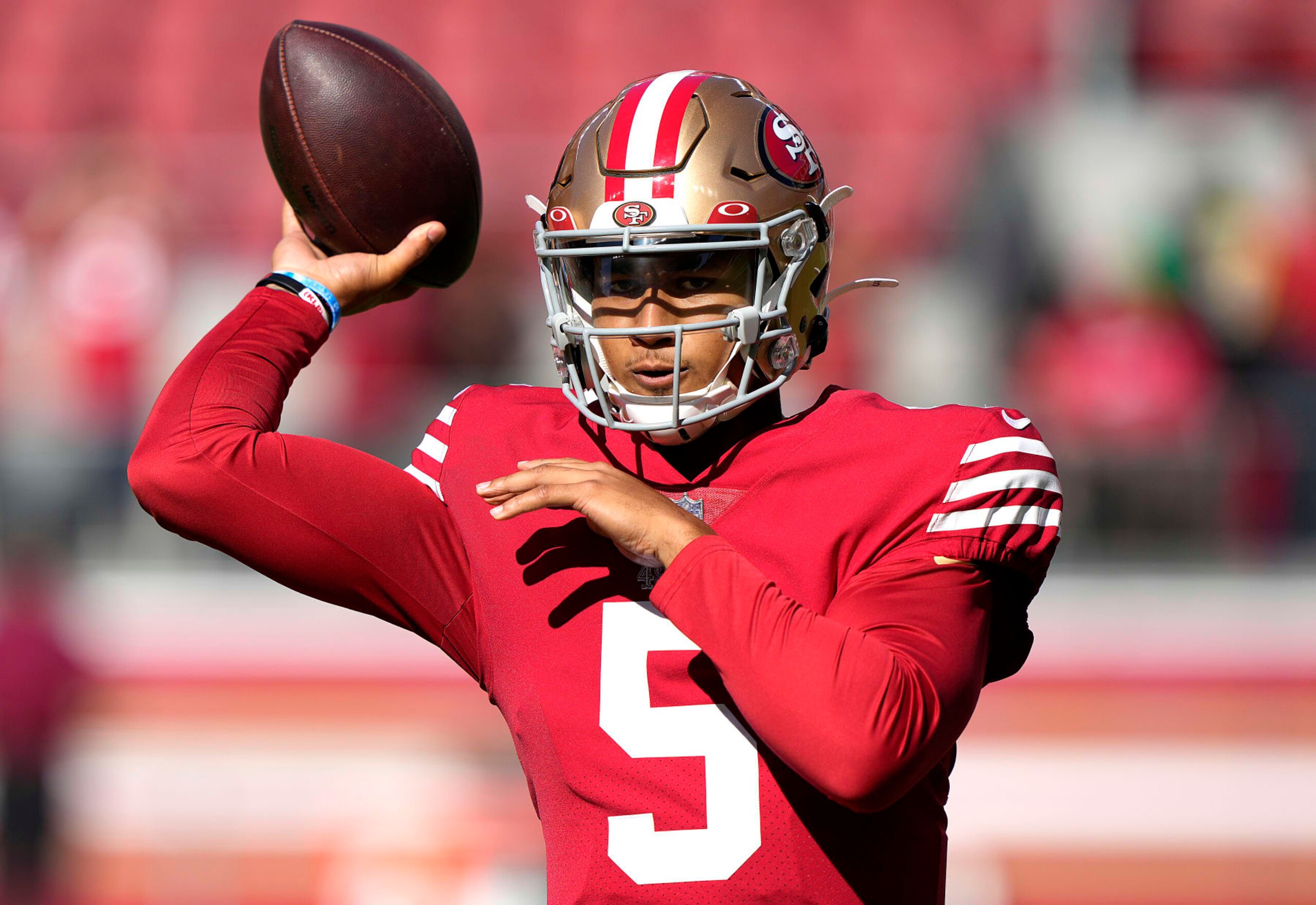 SANTA CLARA, CALIFORNIA - AUGUST 12: Trey Lance #5 of the San Francisco 49ers warms up prior to the start of a preseason NFL game against the Green Bay Packers at Levi's Stadium on August 12, 2022 in Santa Clara, California. (Photo by Thearon W. Henderson/Getty Images)