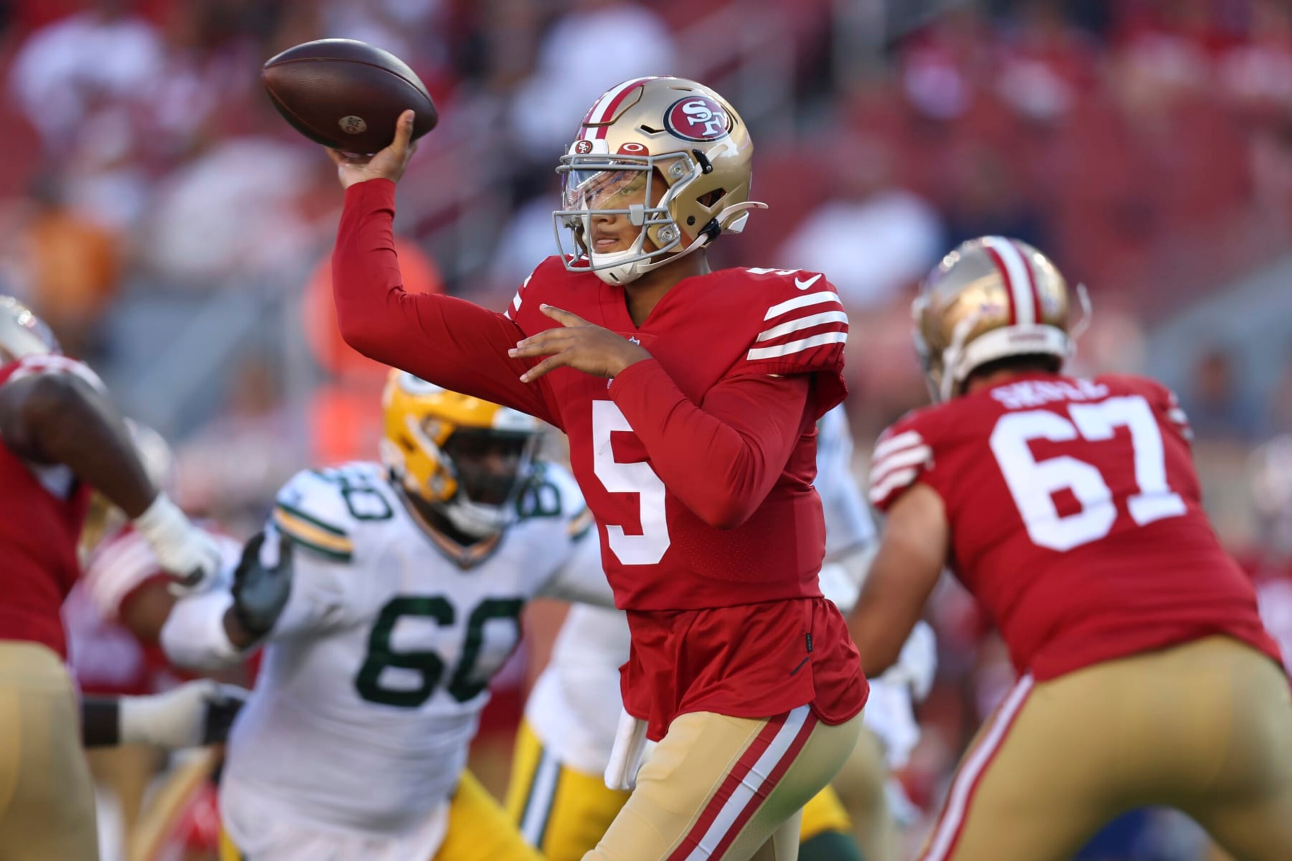 San Francisco 49ers quarterback Trey Lance (5) passes against the Green Bay Packers during the first half of an NFL preseason football game in Santa Clara, Calif., Friday, Aug. 12, 2022. (AP Photo/Jed Jacobsohn) San Francisco 49ers quarterback Trey Lance (5) passes against the Green Bay Packers during the first half of an NFL preseason football game in Santa Clara, Calif., Friday, Aug. 12, 2022. (AP Photo/Jed Jacobsohn)