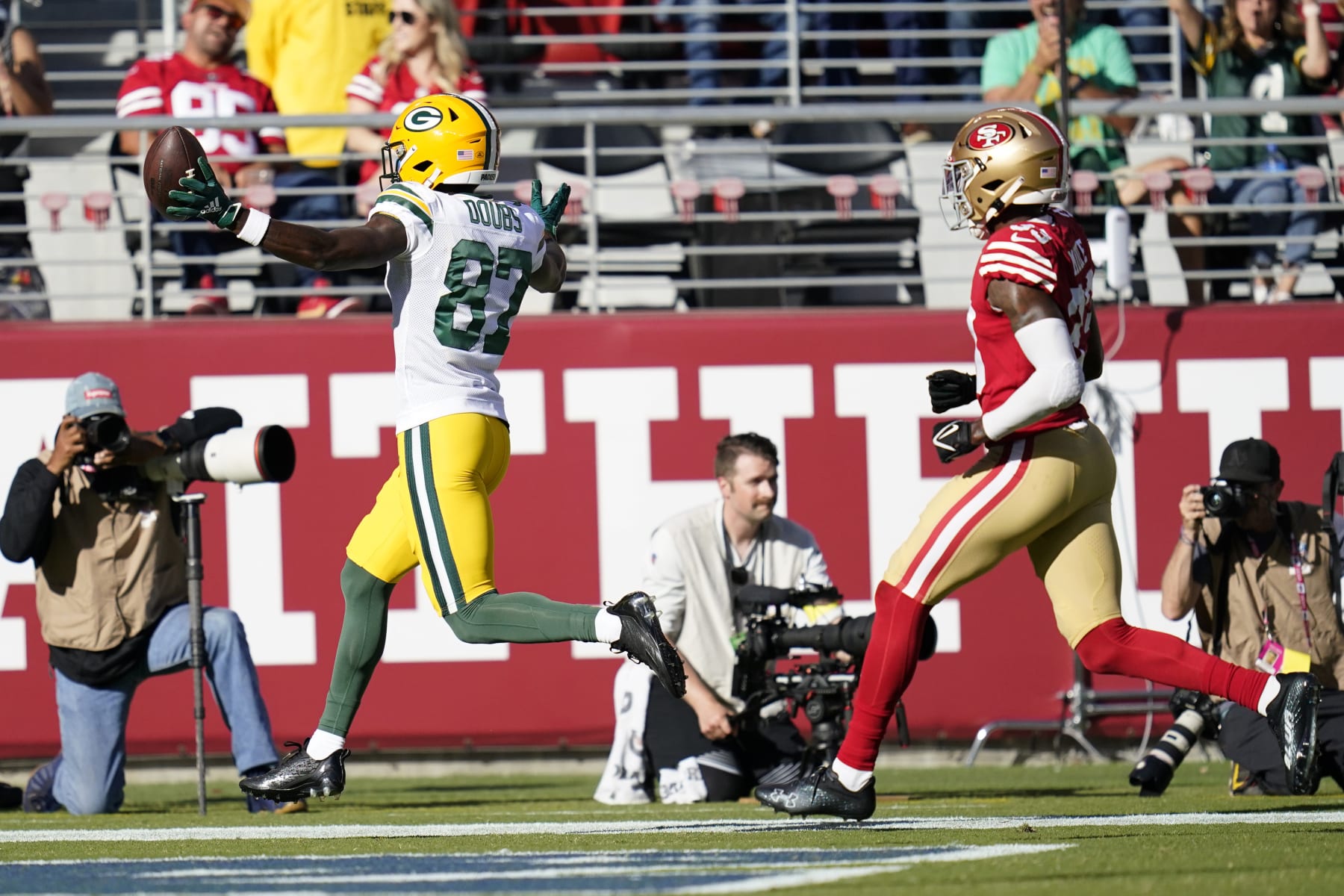 Green Bay Packers wide receiver Romeo Doubs (87) scores against the San Francisco 49ers during the first half of an NFL preseason football game in Santa Clara, Calif., Friday, Aug. 12, 2022. (AP Photo/Godofredo A. Vásquez)