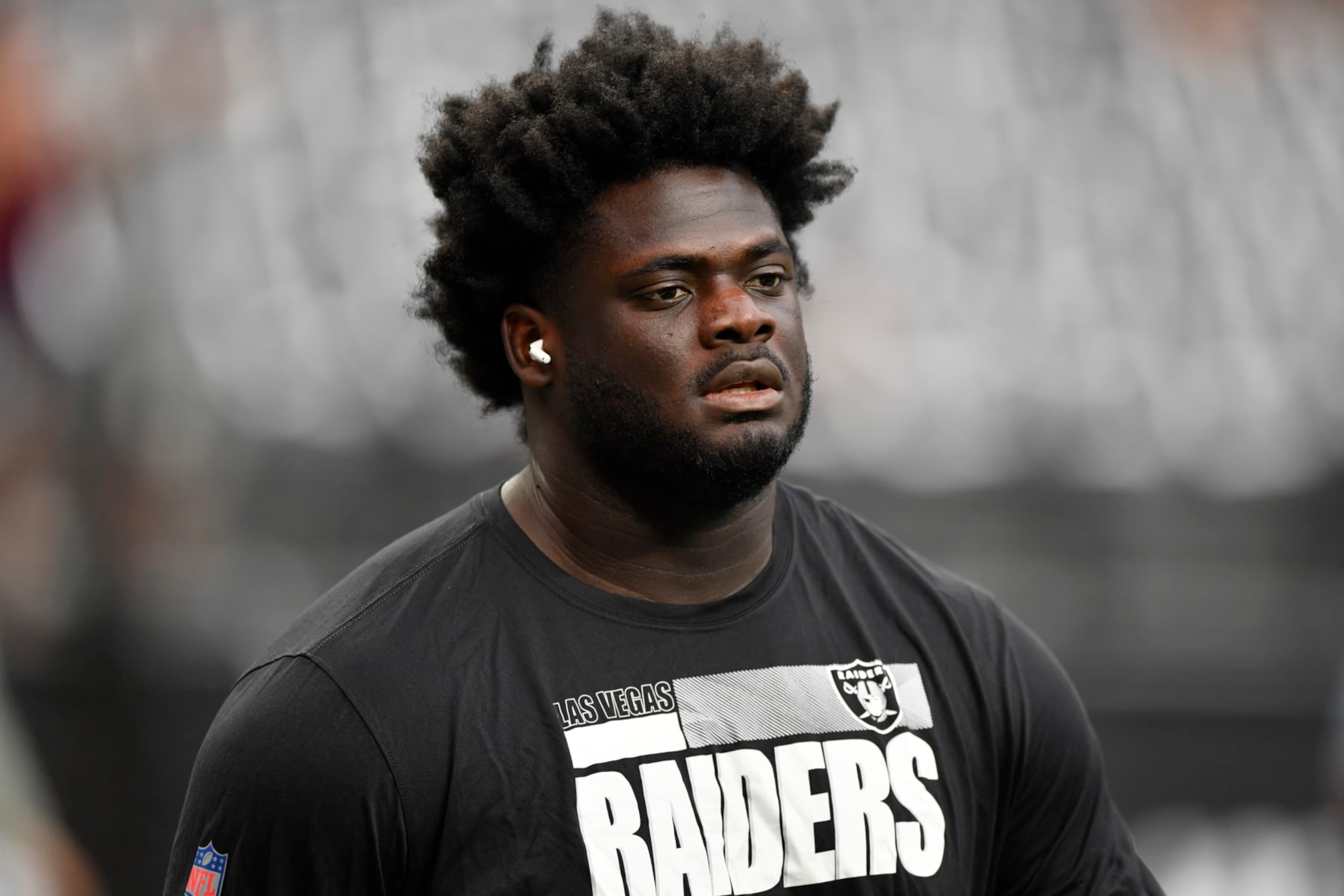 LAS VEGAS, NEVADA - OCTOBER 10:  Offensive tackle Alex Leatherwood #70 of the Las Vegas Raiders looks on during warmups before a game against the Chicago Bears at Allegiant Stadium on October 10, 2021 in Las Vegas, Nevada. The Bears defeated the Raiders 20-9. (Photo by Chris Unger/Getty Images)