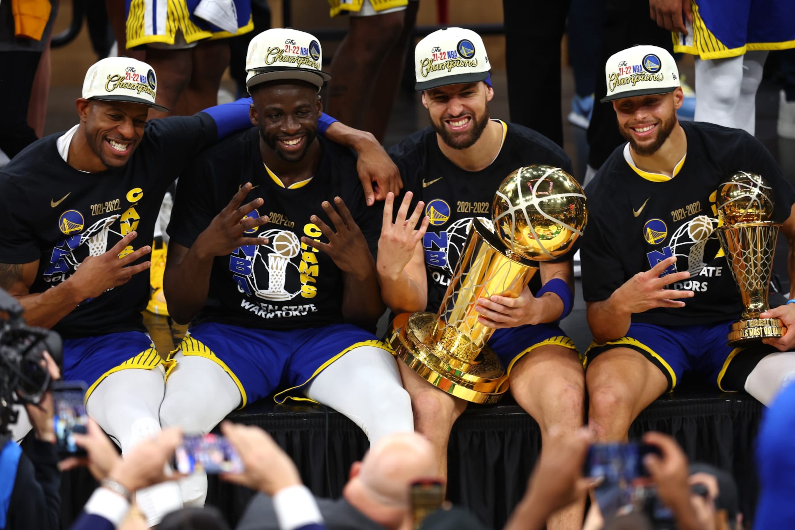 BOSTON, MASSACHUSETTS - JUNE 16: Andre Iguodala #9, Draymond Green #23, Klay Thompson #11 and Stephen Curry #30 of the Golden State Warriors pose for a photo after defeating the Boston Celtics 103-90 in Game Six of the 2022 NBA Finals at TD Garden on June 16, 2022 in Boston, Massachusetts. NOTE TO USER: User expressly acknowledges and agrees that, by downloading and/or using this photograph, User is consenting to the terms and conditions of the Getty Images License Agreement. (Photo by Adam Glanzman/Getty Images)