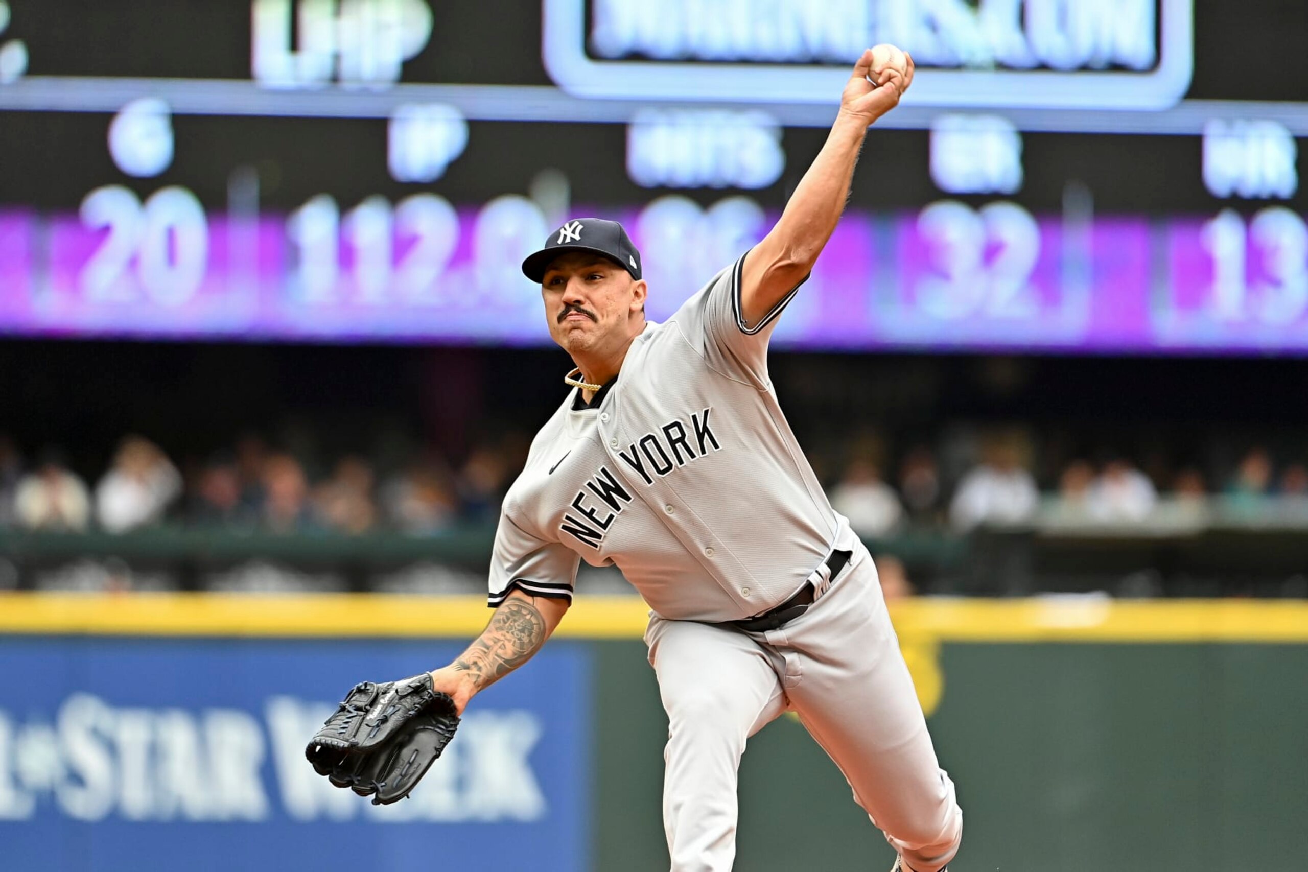 SEATTLE, WASHINGTON - AUGUST 10: Nestor Cortes #65 of the New York Yankees throws a pitch during the first inning against the Seattle Mariners at T-Mobile Park on August 10, 2022 in Seattle, Washington. (Photo by Alika Jenner/Getty Images)