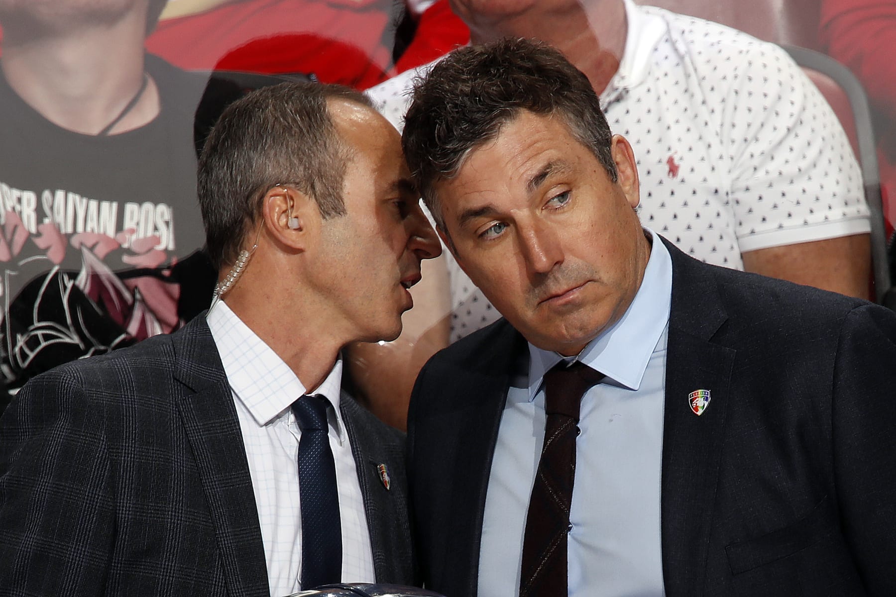 SUNRISE, FL - MARCH 5: Florida Panthers Interim Head Coach Andrew Brunette listens to Assistant Coach Derek MacKenzie during a break in the action against the Detroit Red Wings at the FLA Live Arena on March 5, 2022 in Sunrise, Florida. (Photo by Eliot J. Schechter/NHLI via Getty Images)