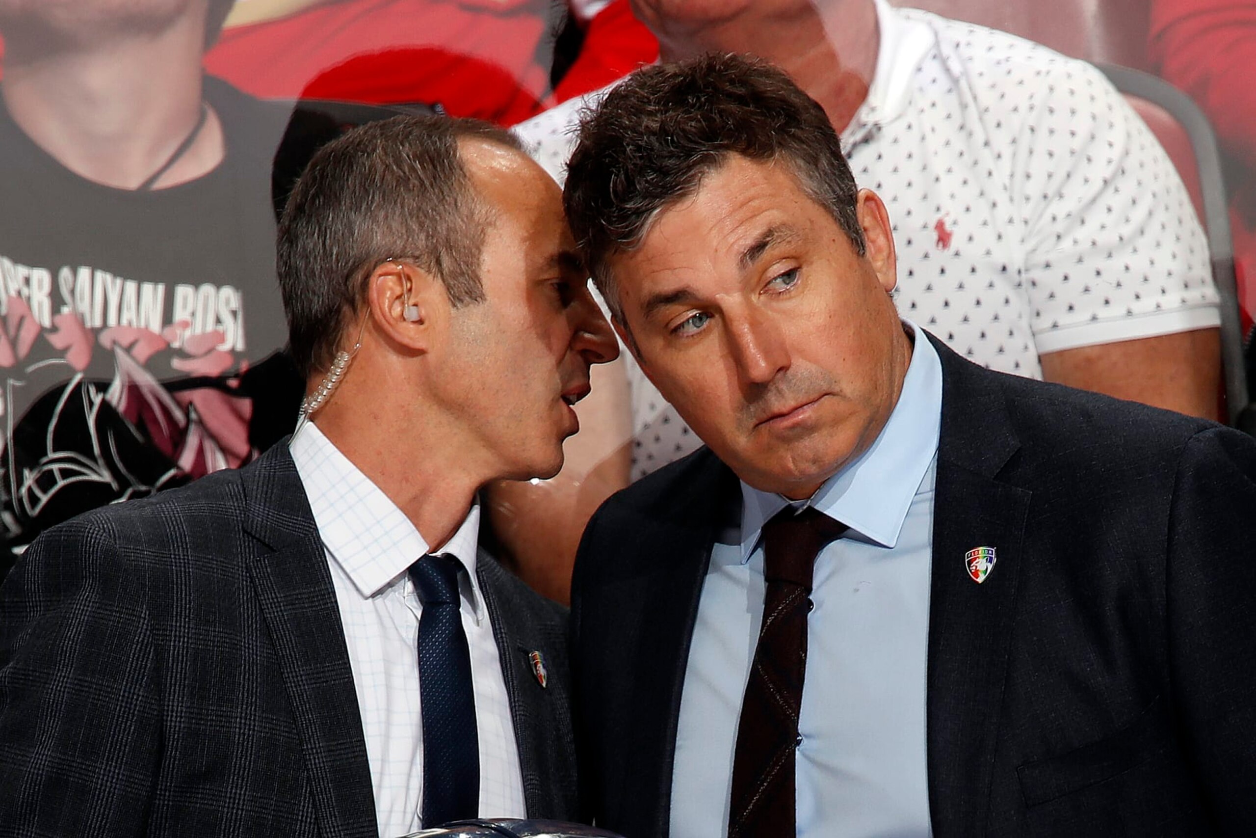 SUNRISE, FL - MARCH 5: Florida Panthers Interim Head Coach Andrew Brunette listens to Assistant Coach Derek MacKenzie during a break in the action against the Detroit Red Wings at the FLA Live Arena on March 5, 2022 in Sunrise, Florida. (Photo by Eliot J. Schechter/NHLI via Getty Images)