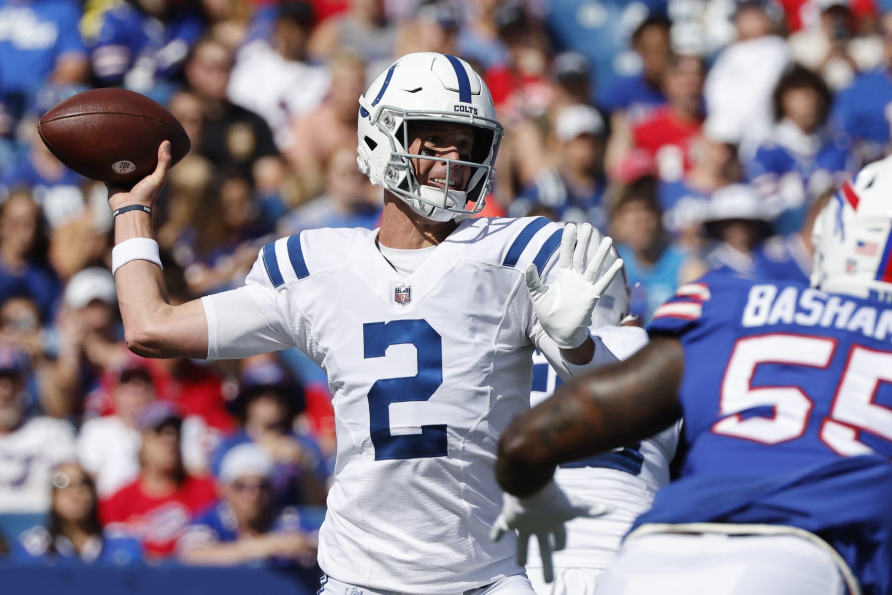 Indianapolis Colts quarterback Matt Ryan (2) passes under pressure from Buffalo Bills defensive end Boogie Basham (55) during the first half of a preseason NFL football game, Saturday, Aug. 13, 2022, in Orchard Park, N.Y. (AP Photo/Jeffrey T. Barnes) Indianapolis Colts quarterback Matt Ryan (2) passes under pressure from Buffalo Bills defensive end Boogie Basham (55) during the first half of a preseason NFL football game, Saturday, Aug. 13, 2022, in Orchard Park, N.Y. (AP Photo/Jeffrey T. Barnes)