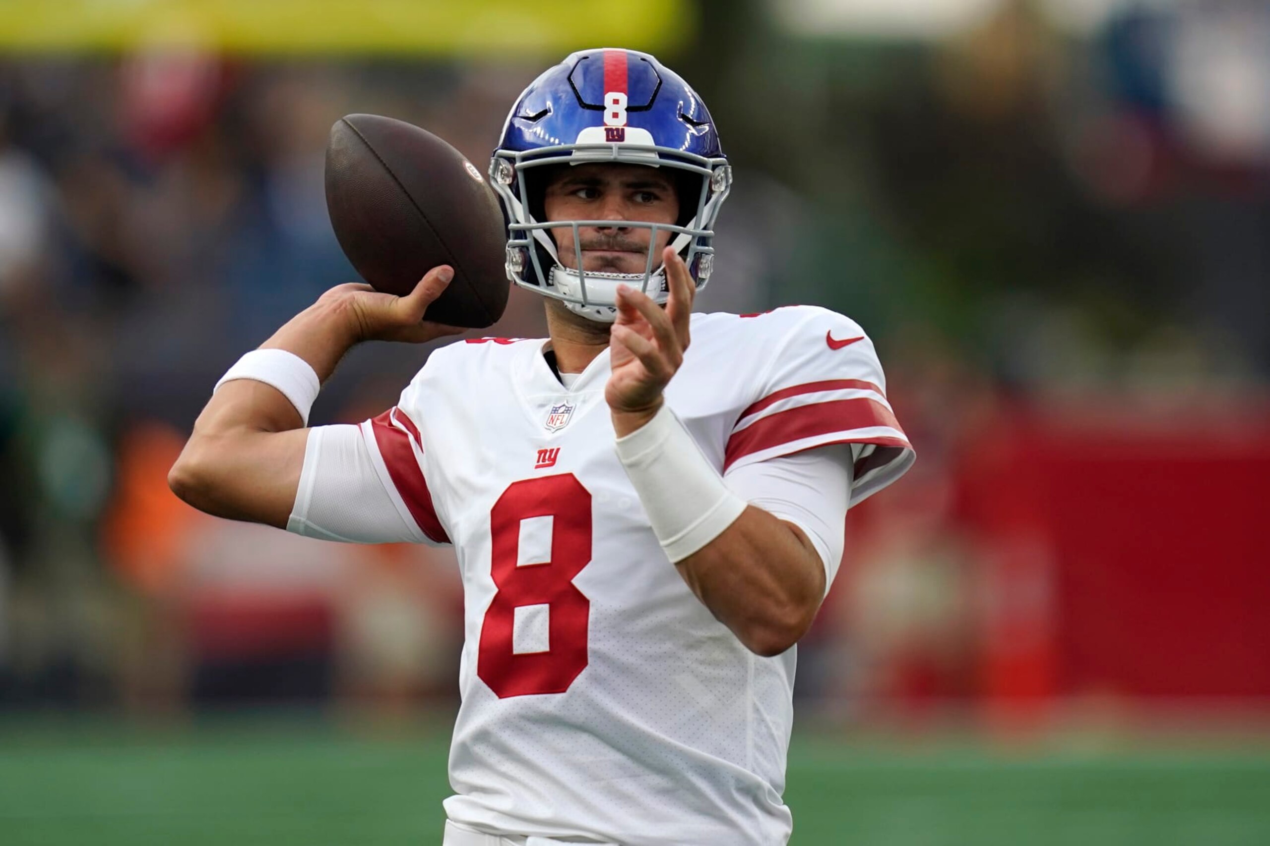 New York Giants quarterback Daniel Jones (8) passes prior to a preseason NFL football game between New York Giants and the New England Patriots, Thursday, Aug. 11, 2022, in Foxborough, Mass. (AP Photo/Charles Krupa)