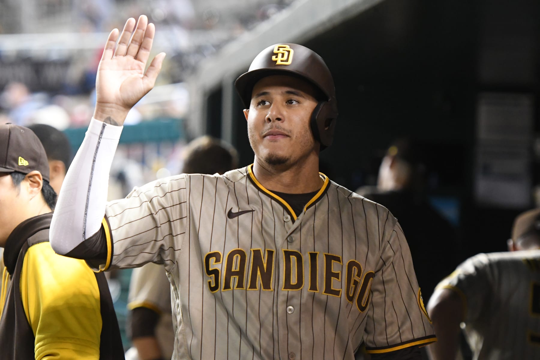 WASHINGTON, DC - AUGUST 12:  Manny Machado #13 of the San Diego Padres celebrates scoring a run in the fifth inning during a baseball game against the Washington Nationals at Nationals Park on August 12, 2022 in Washington, DC.  (Photo by Mitchell Layton/Getty Images)