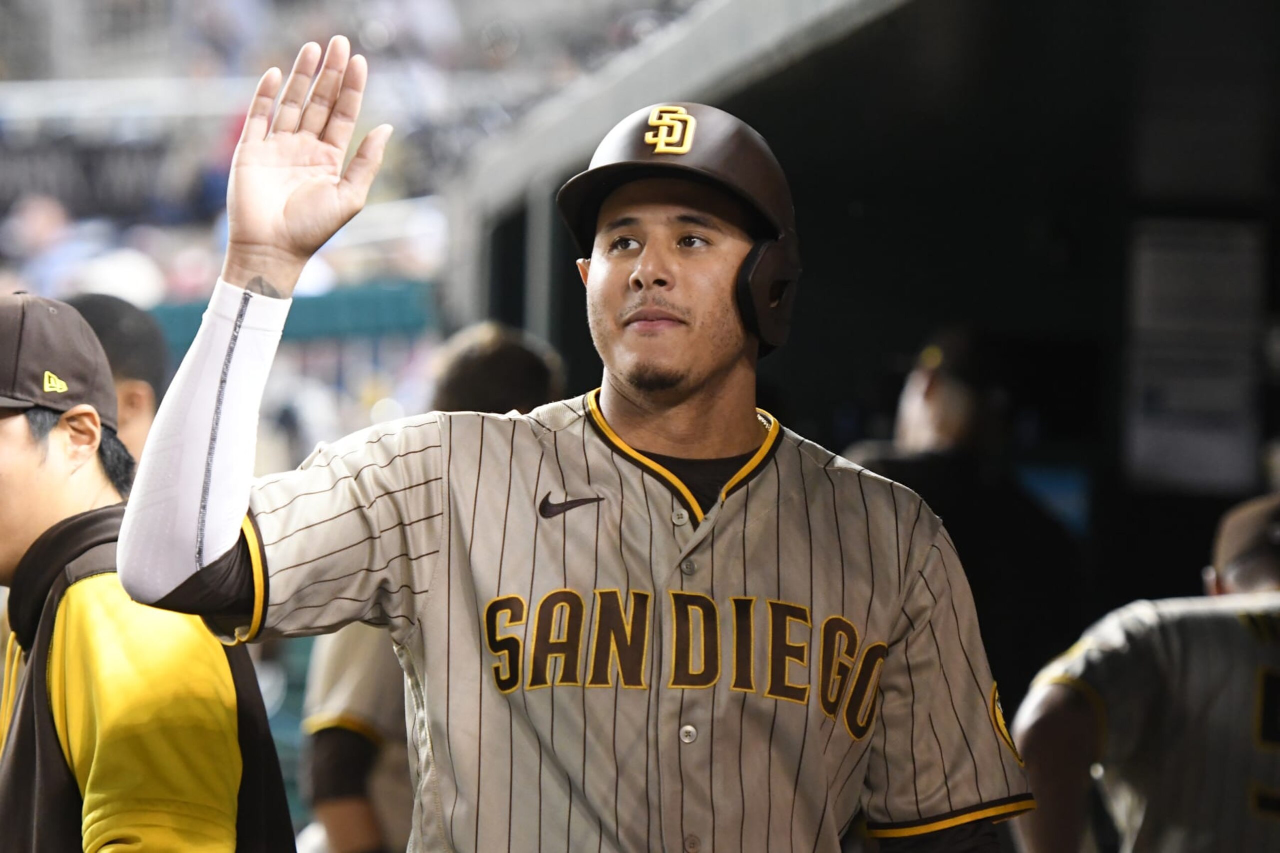 WASHINGTON, DC - AUGUST 12:  Manny Machado #13 of the San Diego Padres celebrates scoring a run in the fifth inning during a baseball game against the Washington Nationals at Nationals Park on August 12, 2022 in Washington, DC.  (Photo by Mitchell Layton/Getty Images)