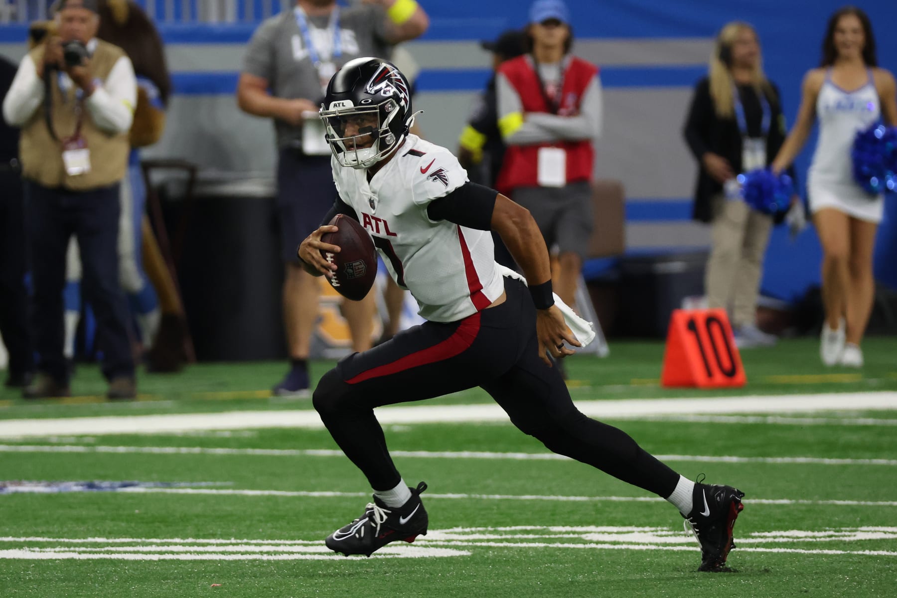 DETROIT, MICHIGAN - AUGUST 12: Marcus Mariota #1 of the Atlanta Falcons runs the ball while playing the Detroit Lions during a NFL preseason game at Ford Field on August 12, 2022 in Detroit, Michigan. (Photo by Gregory Shamus/Getty Images)