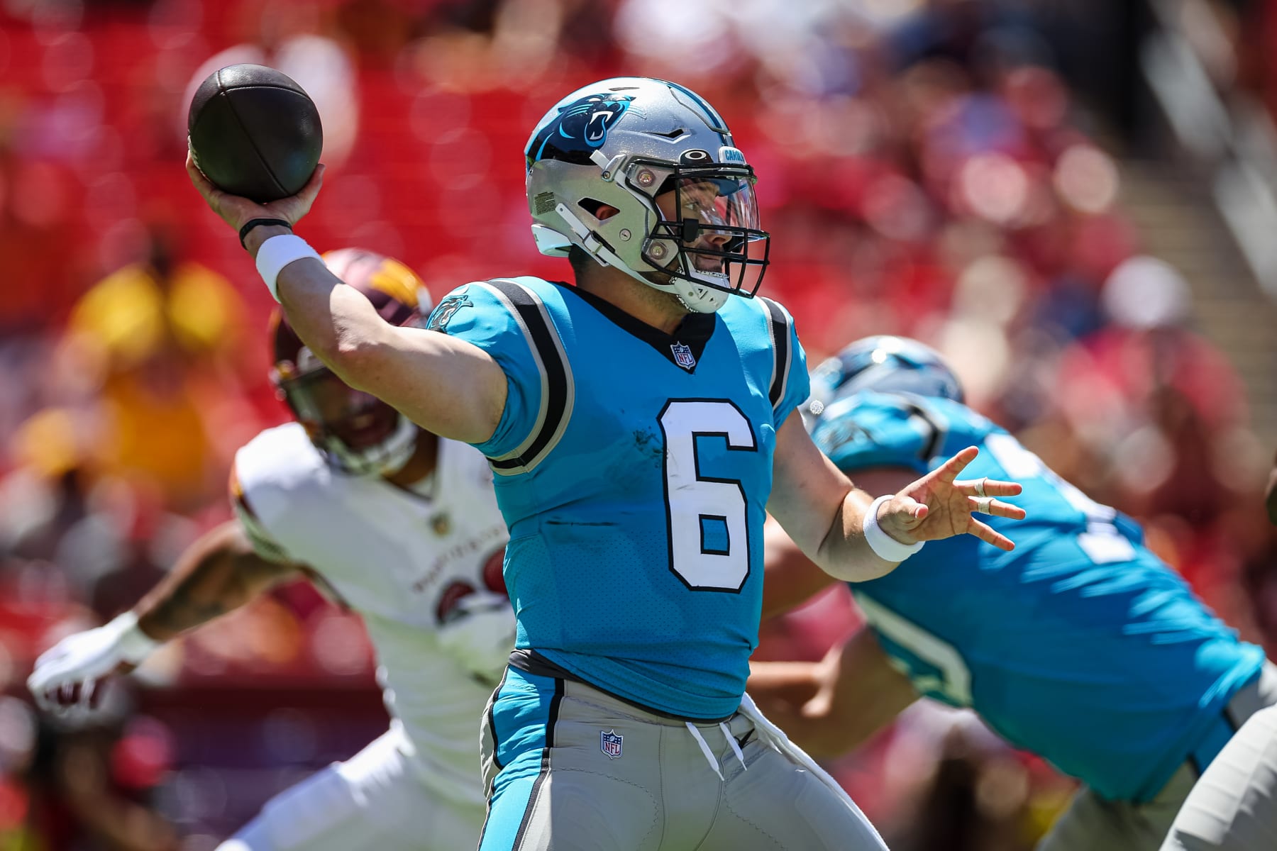 LANDOVER, MD - AUGUST 13: Baker Mayfield #6 of the Carolina Panthers looks to pass against the Washington Commanders during the first half of the preseason game at FedExField on August 13, 2022 in Landover, Maryland. (Photo by Scott Taetsch/Getty Images)