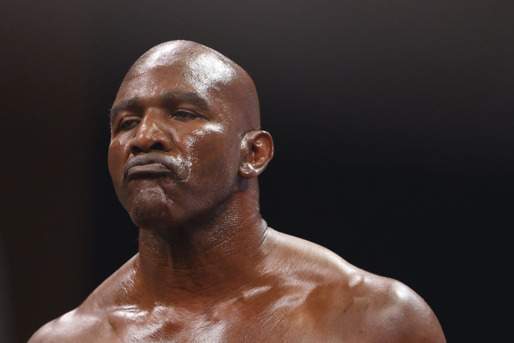 HOLLYWOOD, FLORIDA - SEPTEMBER 11: Evander Holyfield looks on prior to the fight against Vitor Belfort during Evander Holyfield vs. Vitor Belfort presented by Triller at Seminole Hard Rock Hotel & Casino on September 11, 2021 in Hollywood, Florida. (Photo by Douglas P. DeFelice/Getty Images)