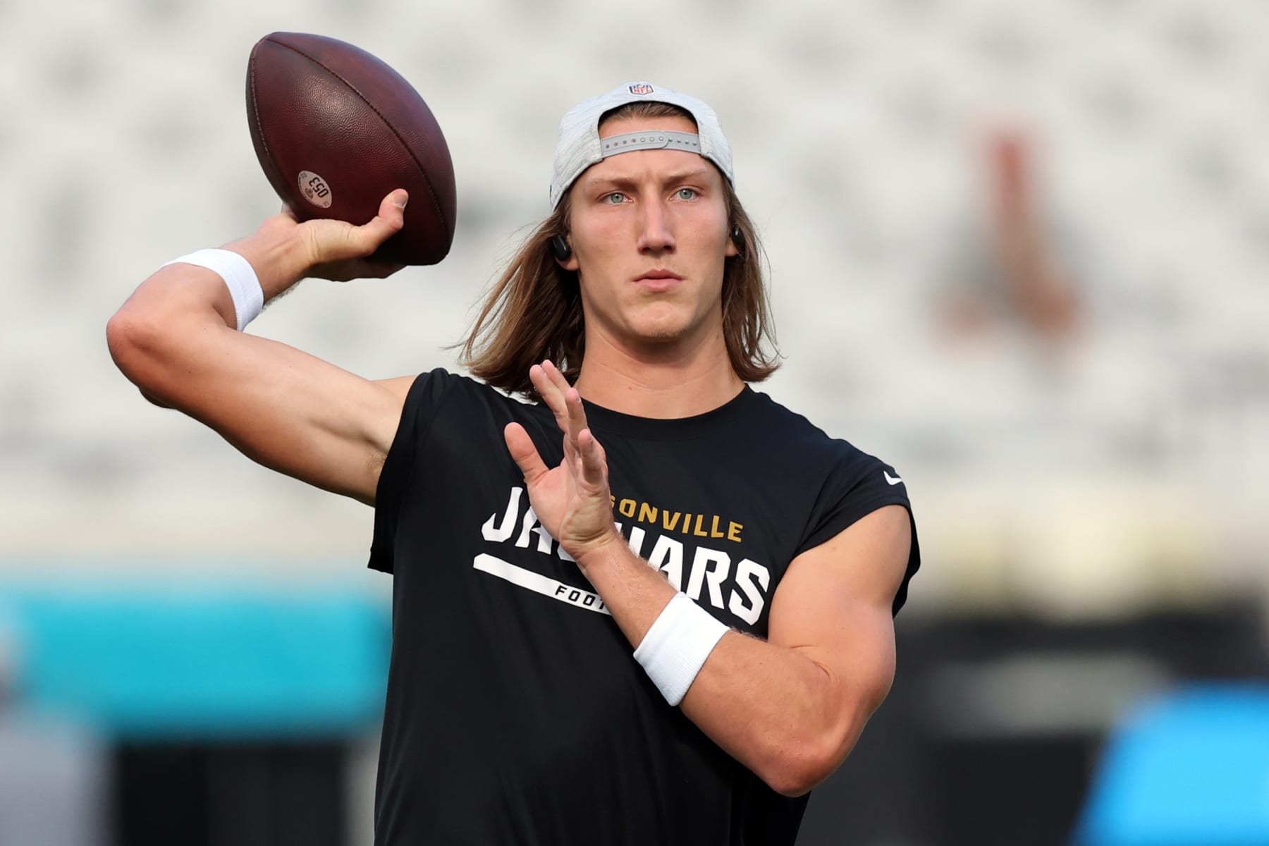 JACKSONVILLE, FL - AUGUST 12: Trevor Lawrence #16 of the Jacksonville Jaguars warms up prior to a football game against the Cleveland Browns at TIAA Bank Field on August 12, 2022 in Jacksonville, Florida. (Photo by Mike Carlson/Getty Images)