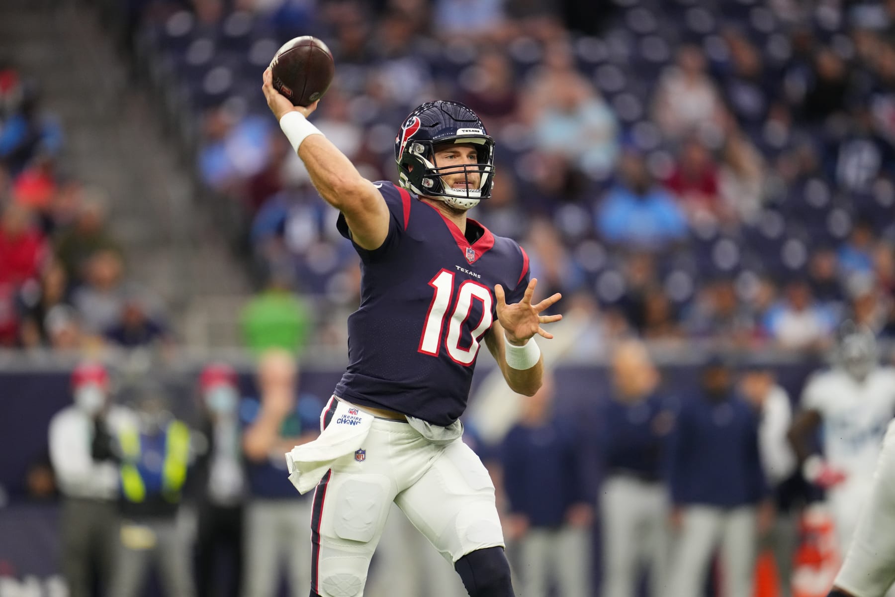 HOUSTON, TEXAS - JANUARY 09: Davis Mills #10 of the Houston Texans throws the ball against the Tennessee Titans during an NFL game at NRG Stadium on January 09, 2022 in Houston, Texas. (Photo by Cooper Neill/Getty Images)