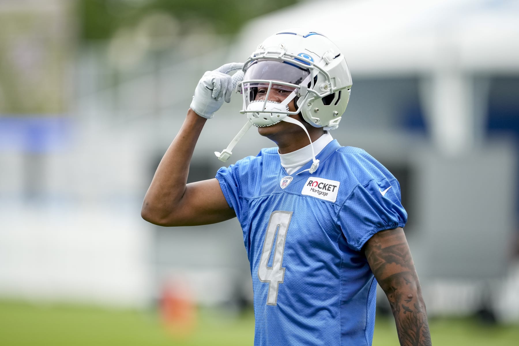 ALLEN PARK, MICHIGAN - JULY 27: DJ Chark #4 of the Detroit Lions reacts during the Detroit Lions Training Camp on July 27, 2022 in Allen Park, Michigan. (Photo by Nic Antaya/Getty Images)
