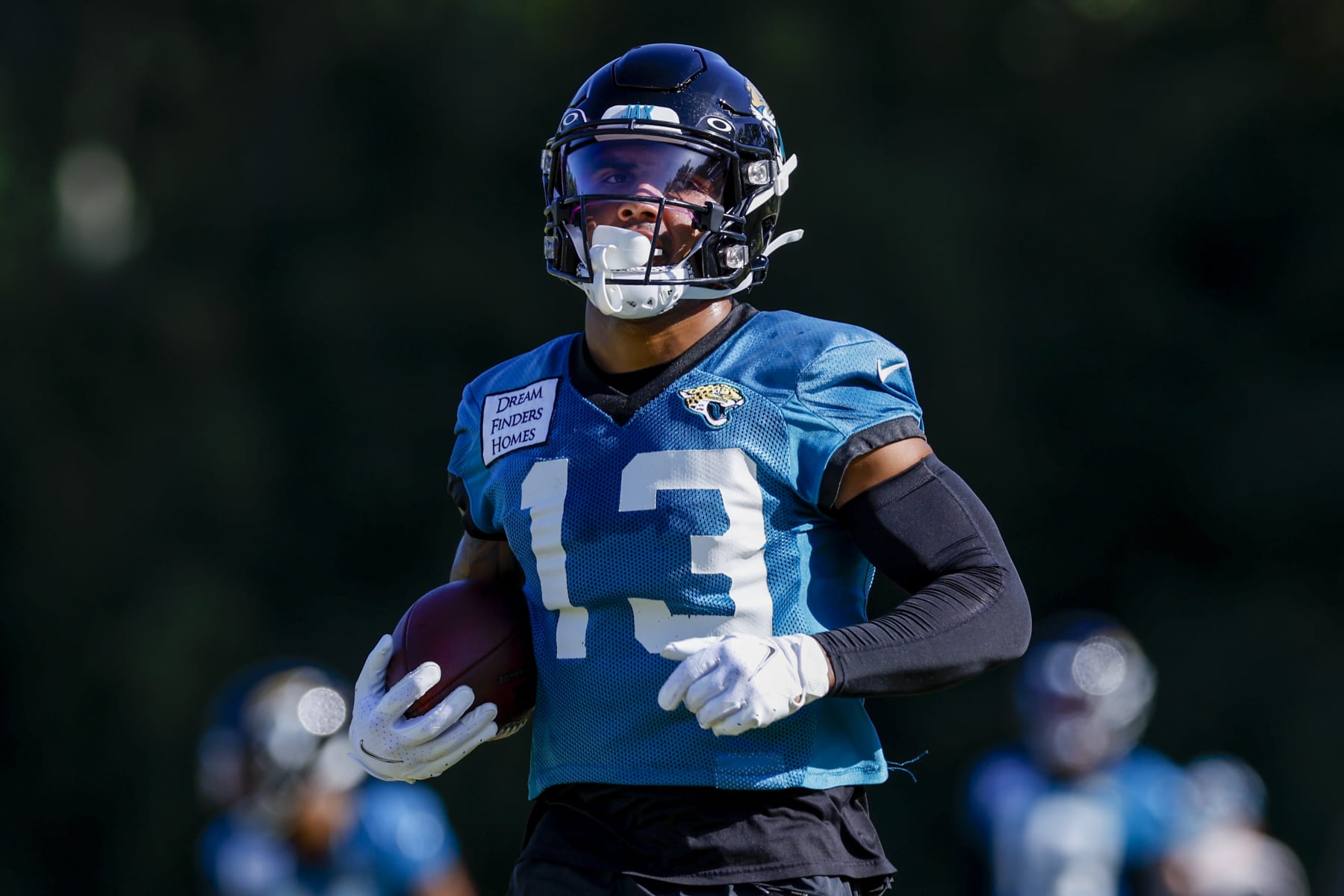 JACKSONVILLE, FL - JULY 27: Jacksonville Jaguars wide receiver Christian Kirk (13) runs with the ball during training camp on July 27, 2022 at Episcopal School of Jacksonville in Jacksonville, Fl. (Photo by David Rosenblum/Icon Sportswire via Getty Images)