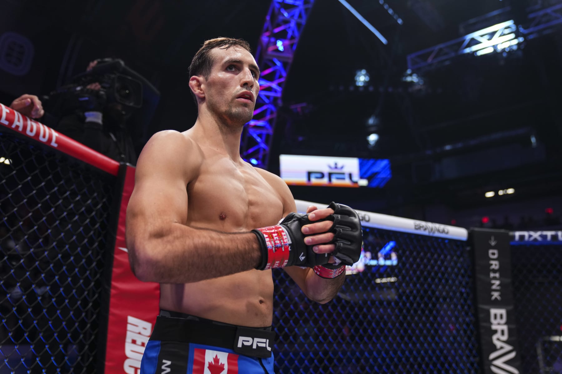 ATLANTA, GA - JULY 01:  Rory MacDonald looks on Sadibou Sy during PFL 6 at the Overtime Elite Arena on July 1, 2022 in Atlanta, Georgia.  (Photo by Cooper Neill/Getty Images)