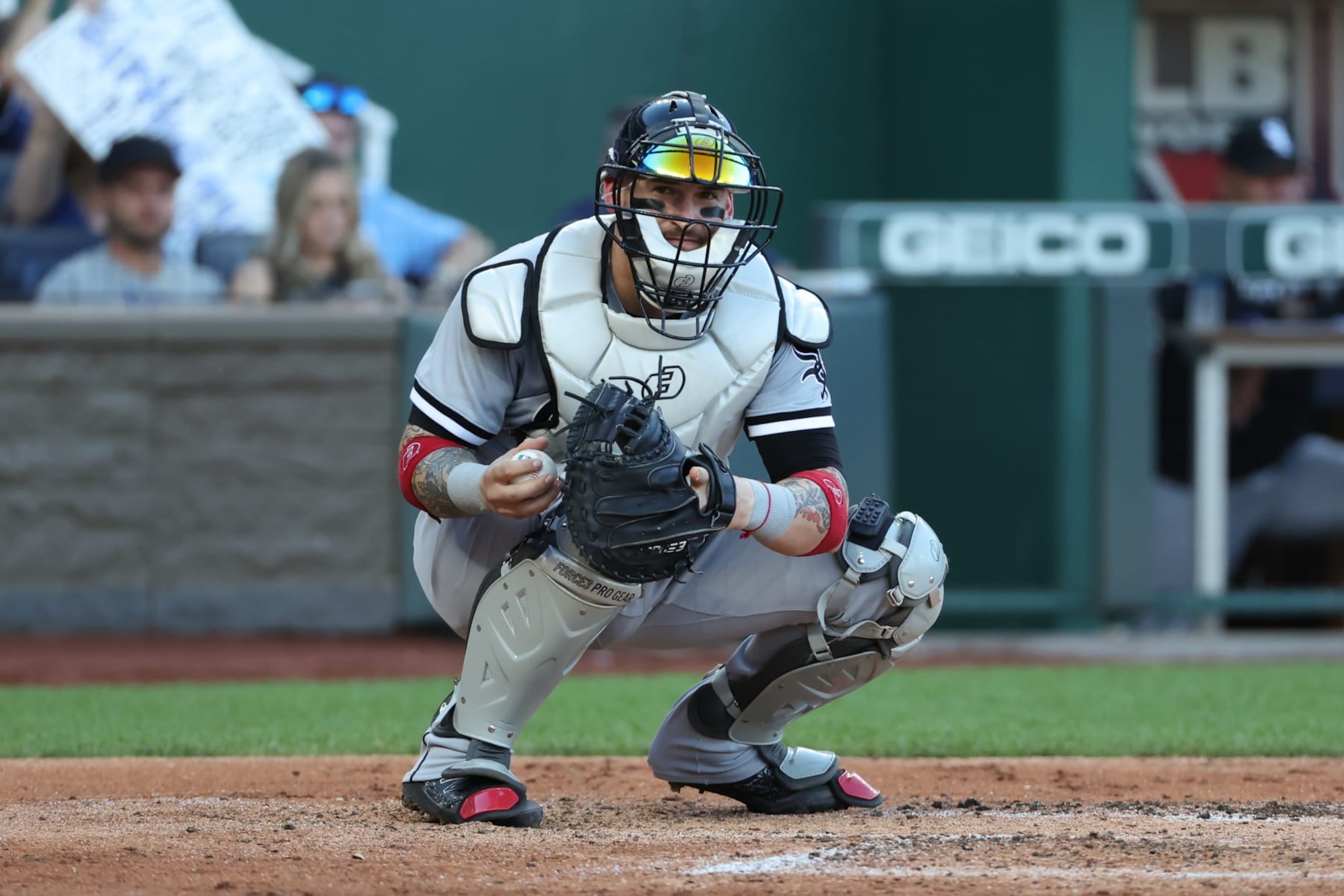 KANSAS CITY, MO - AUGUST 09: Chicago White Sox catcher Yasmani Grandal (24) catches a ball between innings during an MLB game between the Chicago White Sox and Kansas City Royals on August 9, 2022 at Kauffman Stadium in Kansas City, MO. (Photo by Scott Winters/Icon Sportswire via Getty Images) KANSAS CITY, MO - AUGUST 09: Chicago White Sox catcher Yasmani Grandal (24) catches a ball between innings during an MLB game between the Chicago White Sox and Kansas City Royals on August 9, 2022 at Kauffman Stadium in Kansas City, MO. (Photo by Scott Winters/Icon Sportswire via Getty Images)