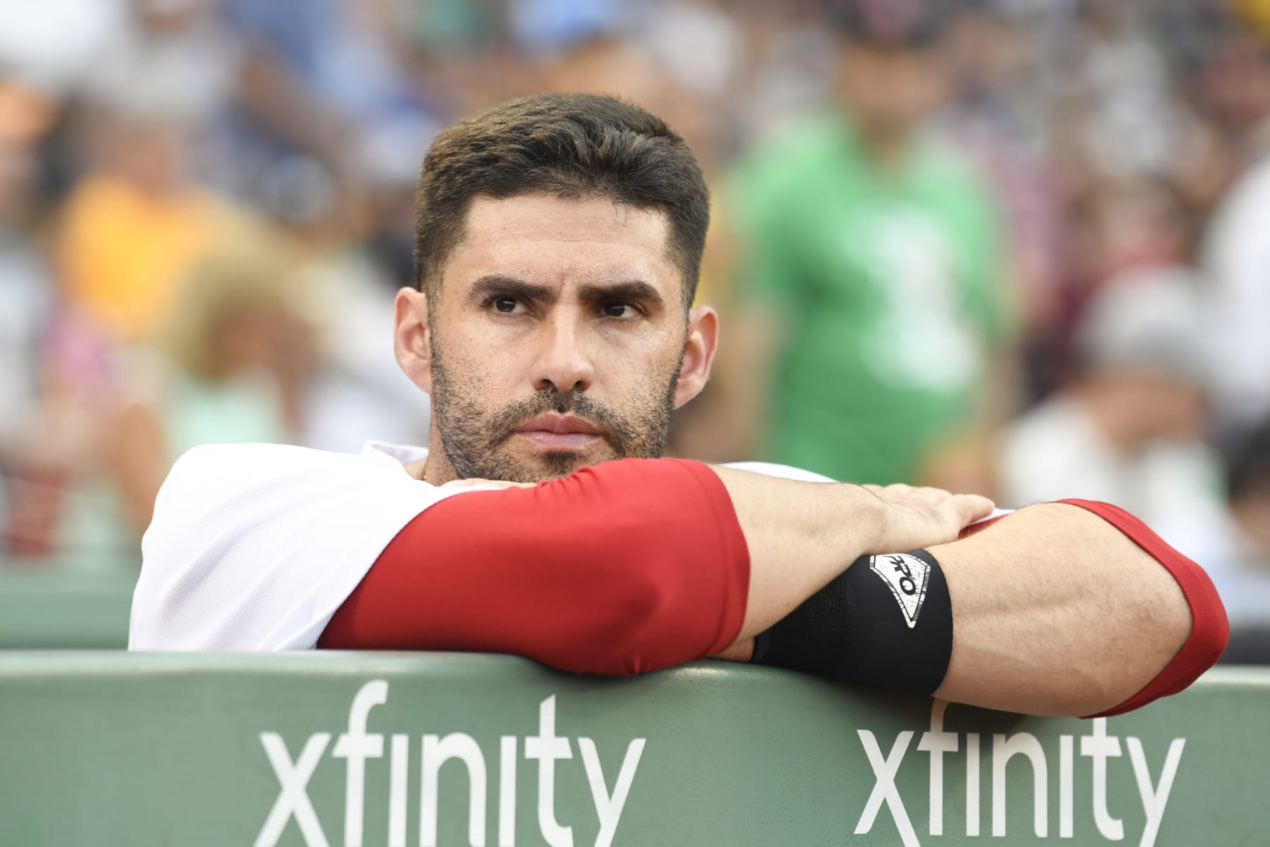 BOSTON, MASSACHUSETTS - AUGUST 14: J.D. Martinez #28 of the Boston Red Sox watches the pregame ceremony before a game against the New York Yankees at Fenway Park on August 14, 2022 in Boston, Massachusetts. (Photo by Brian Fluharty/Getty Images)