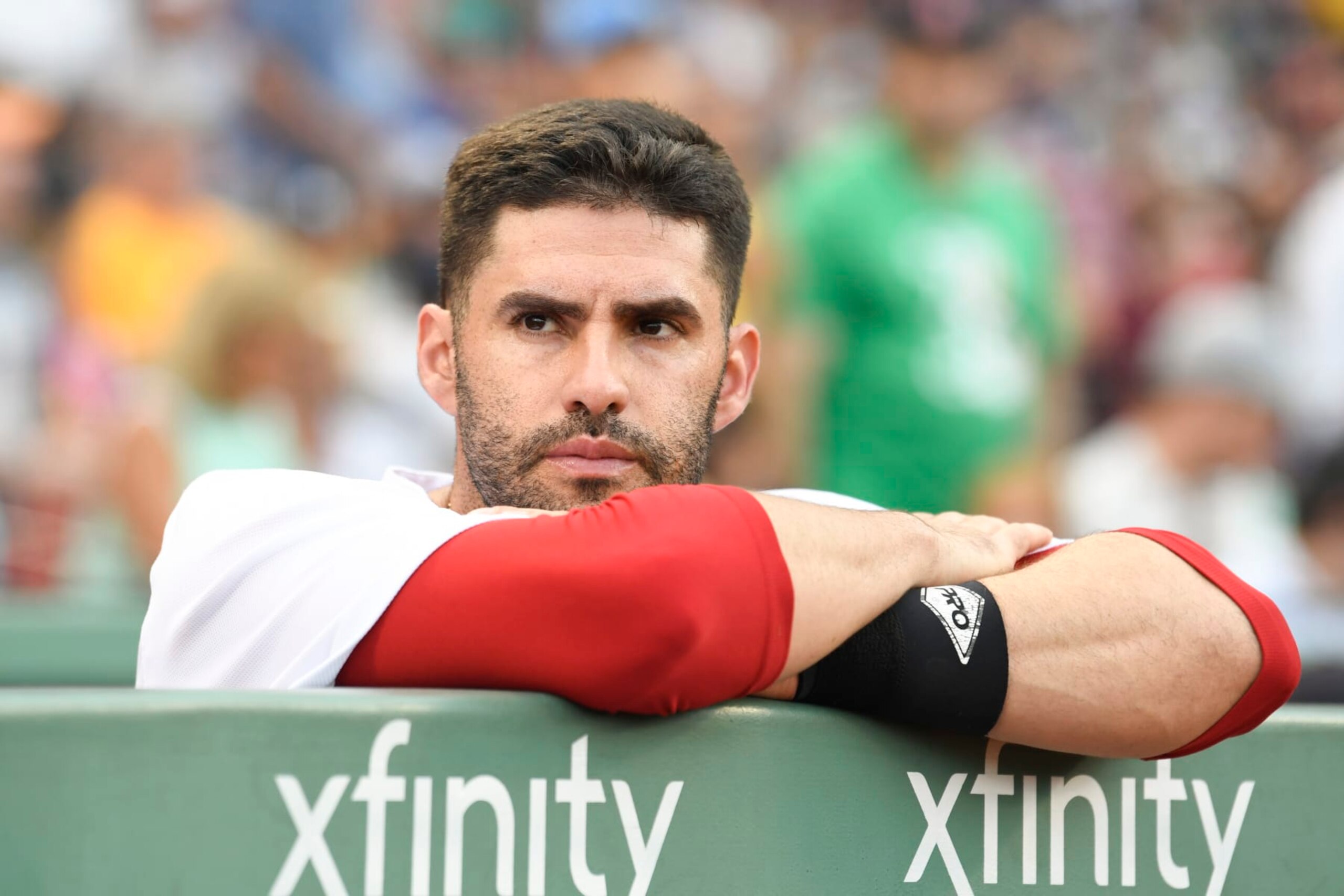 BOSTON, MASSACHUSETTS - AUGUST 14: J.D. Martinez #28 of the Boston Red Sox watches the pregame ceremony before a game against the New York Yankees at Fenway Park on August 14, 2022 in Boston, Massachusetts. (Photo by Brian Fluharty/Getty Images)