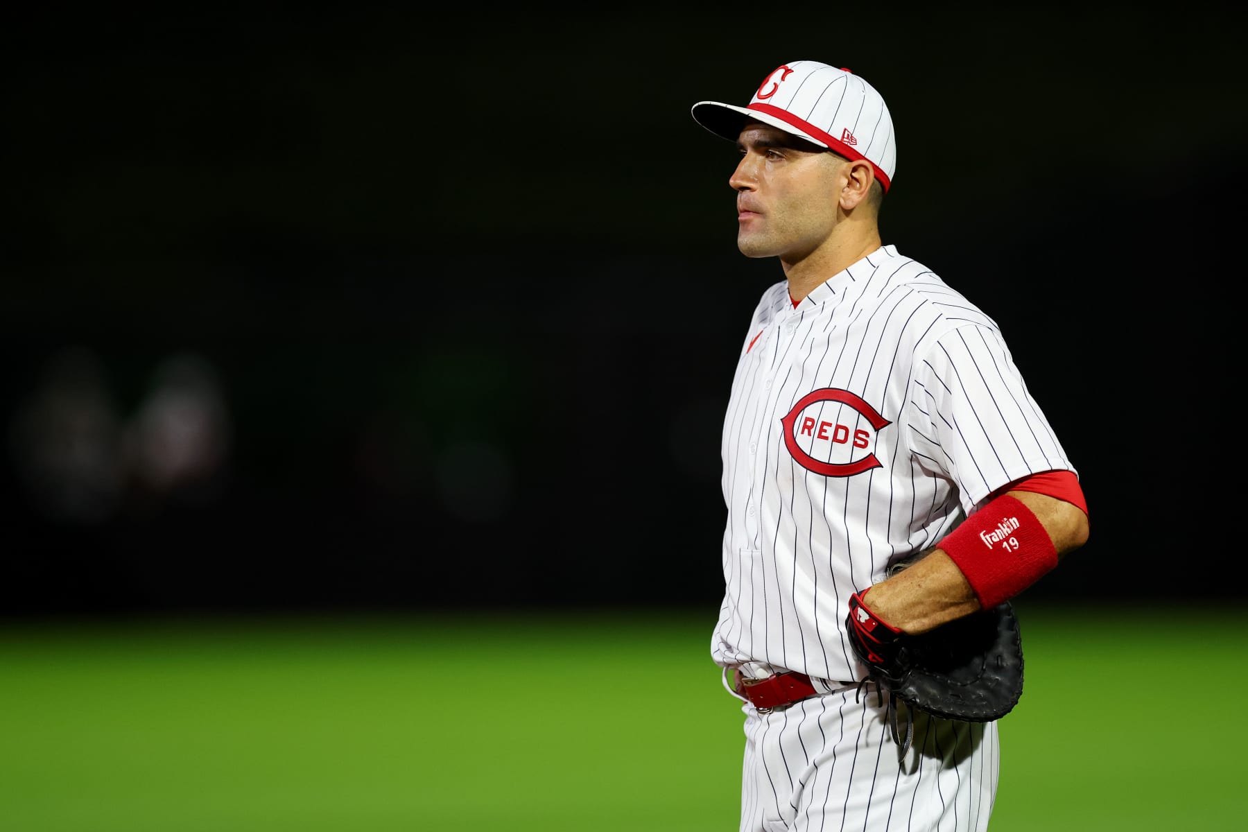 DYERSVILLE, IOWA - AUGUST 11: Joey Votto #19 of the Cincinnati Reds looks on during the eighth inning of the game against the Chicago Cubs at Field of Dreams on August 11, 2022 in Dyersville, Iowa. (Photo by Michael Reaves/Getty Images)