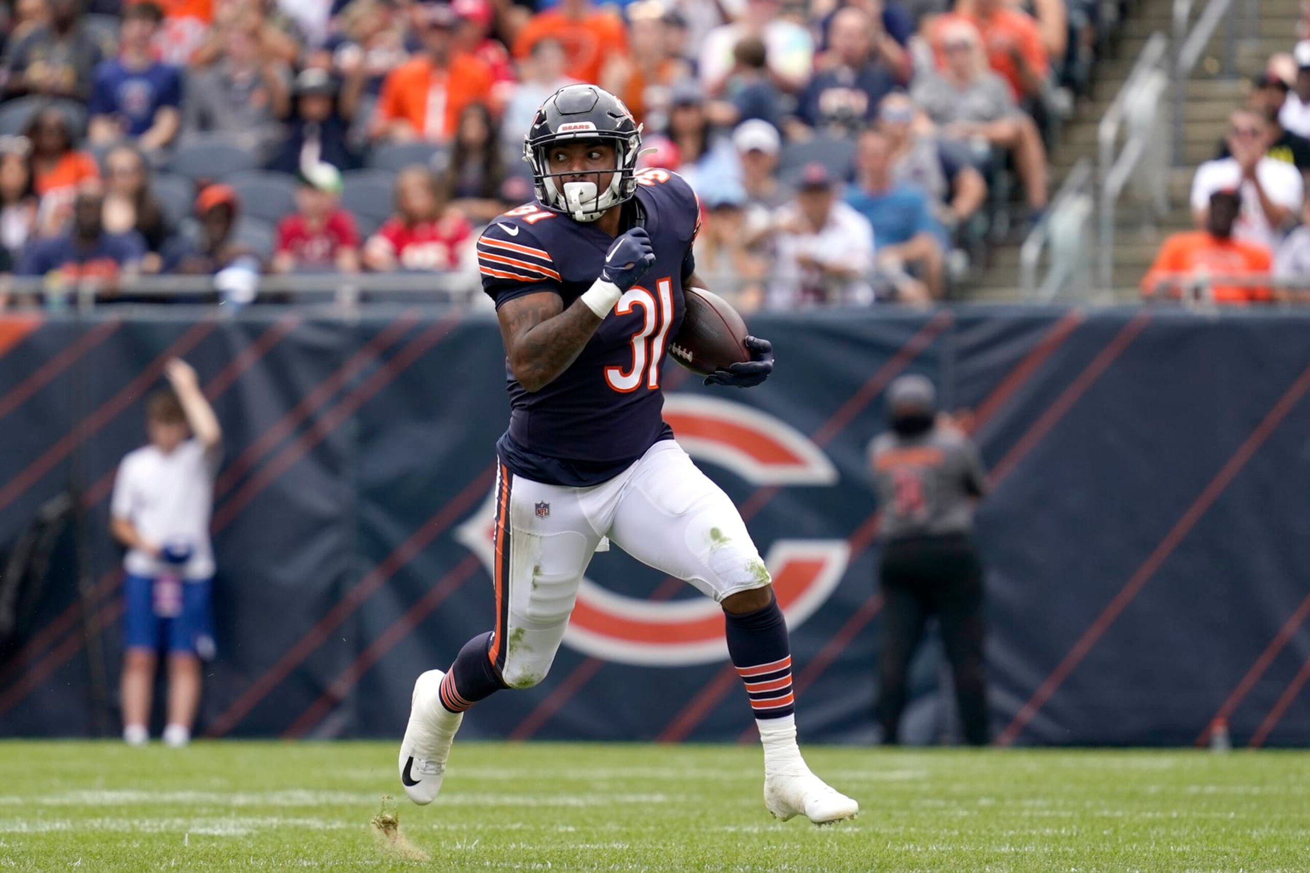Chicago Bears running back Trestan Ebner carries the ball during the first half of an NFL preseason football game against the Kansas City Chiefs Saturday, Aug. 13, 2022, in Chicago. (AP Photo/Nam Y. Huh) Chicago Bears running back Trestan Ebner carries the ball during the first half of an NFL preseason football game against the Kansas City Chiefs Saturday, Aug. 13, 2022, in Chicago. (AP Photo/Nam Y. Huh)