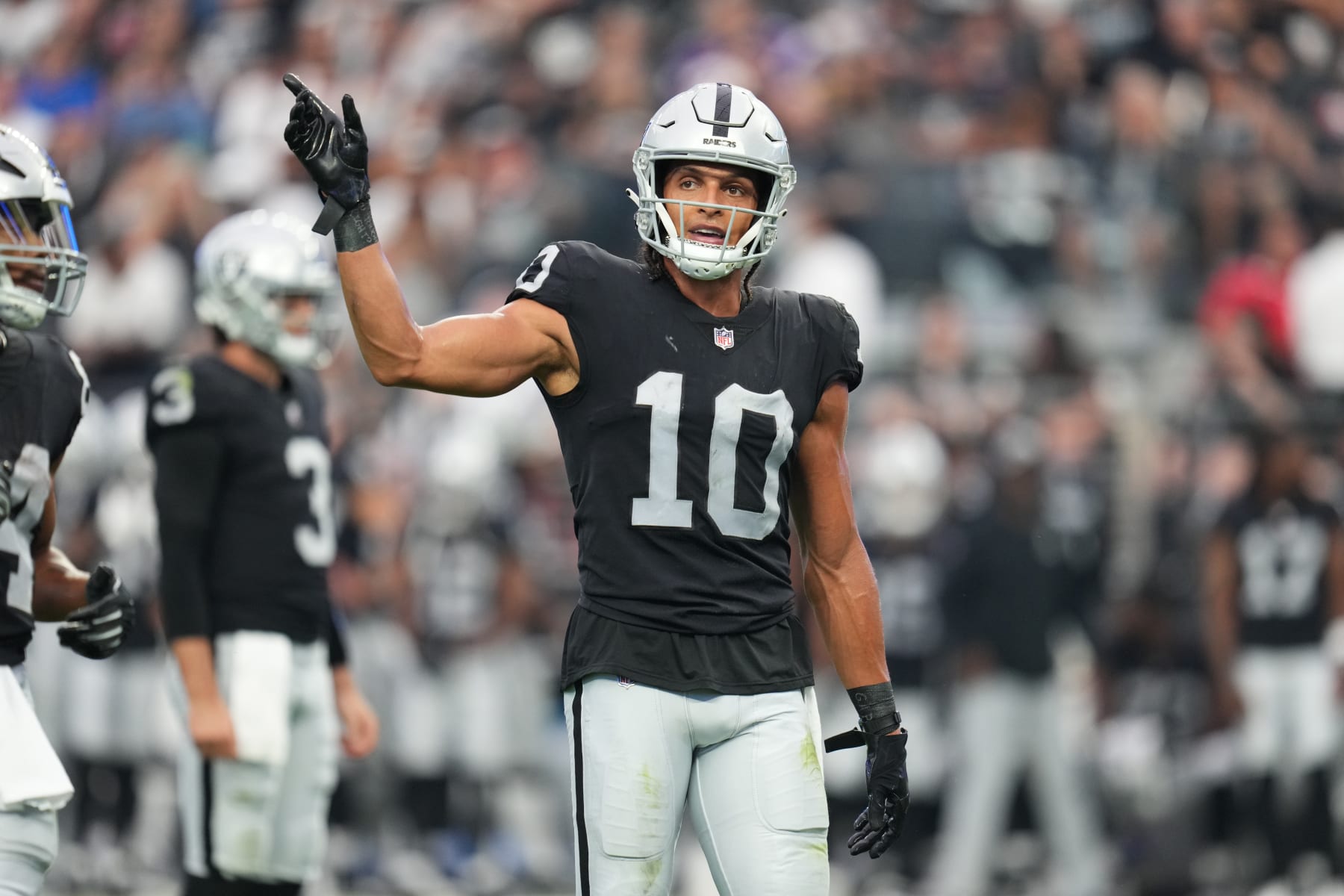 LAS VEGAS, NEVADA - AUGUST 14:  Wide receiver Mack Hollins #10 of the Las Vegas Raiders stands on the line of scrimmage during the first half of a preseason game against the Minnesota Vikings at Allegiant Stadium on August 14, 2022 in Las Vegas, Nevada. (Photo by Chris Unger/Getty Images)
