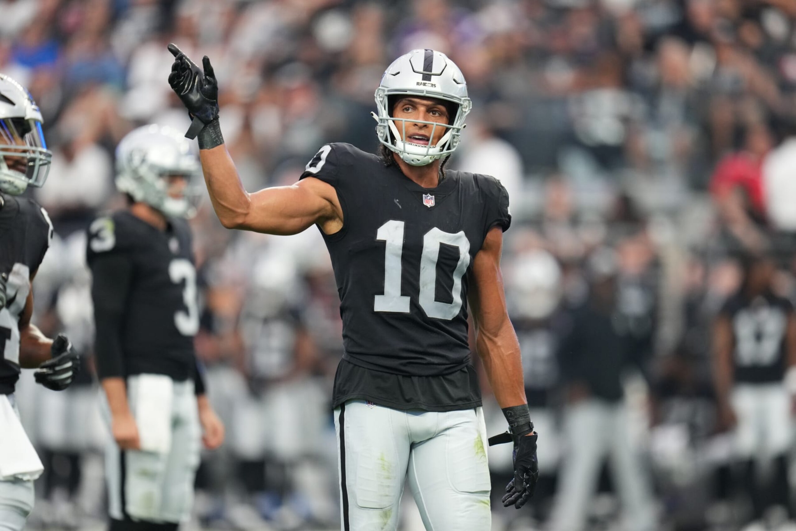 LAS VEGAS, NEVADA - AUGUST 14: Wide receiver Mack Hollins #10 of the Las Vegas Raiders stands on the line of scrimmage during the first half of a preseason game against the Minnesota Vikings at Allegiant Stadium on August 14, 2022 in Las Vegas, Nevada. (Photo by Chris Unger/Getty Images) LAS VEGAS, NEVADA - AUGUST 14: Wide receiver Mack Hollins #10 of the Las Vegas Raiders stands on the line of scrimmage during the first half of a preseason game against the Minnesota Vikings at Allegiant Stadium on August 14, 2022 in Las Vegas, Nevada. (Photo by Chris Unger/Getty Images)