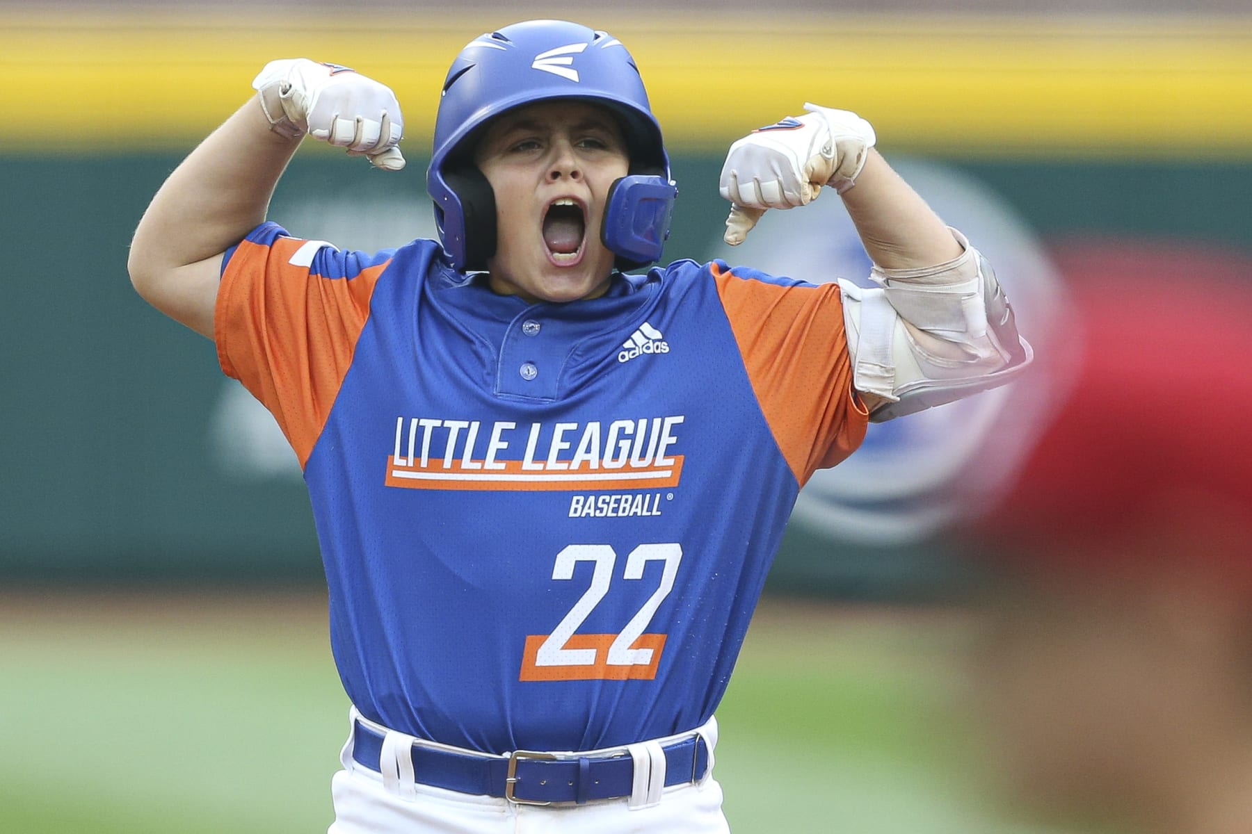 WILLIAMSPORT, PENNSYLVANIA - AUGUST 29: Jackson Surma #22 of Team Michigan celebrates hitting a two-run double in the fifth inning of the 2021 Little League World Series against Team Ohio at Howard J. Lamade Stadium on August 29, 2021 in Williamsport, Pennsylvania. (Photo by Joshua Bessex/Getty Images)