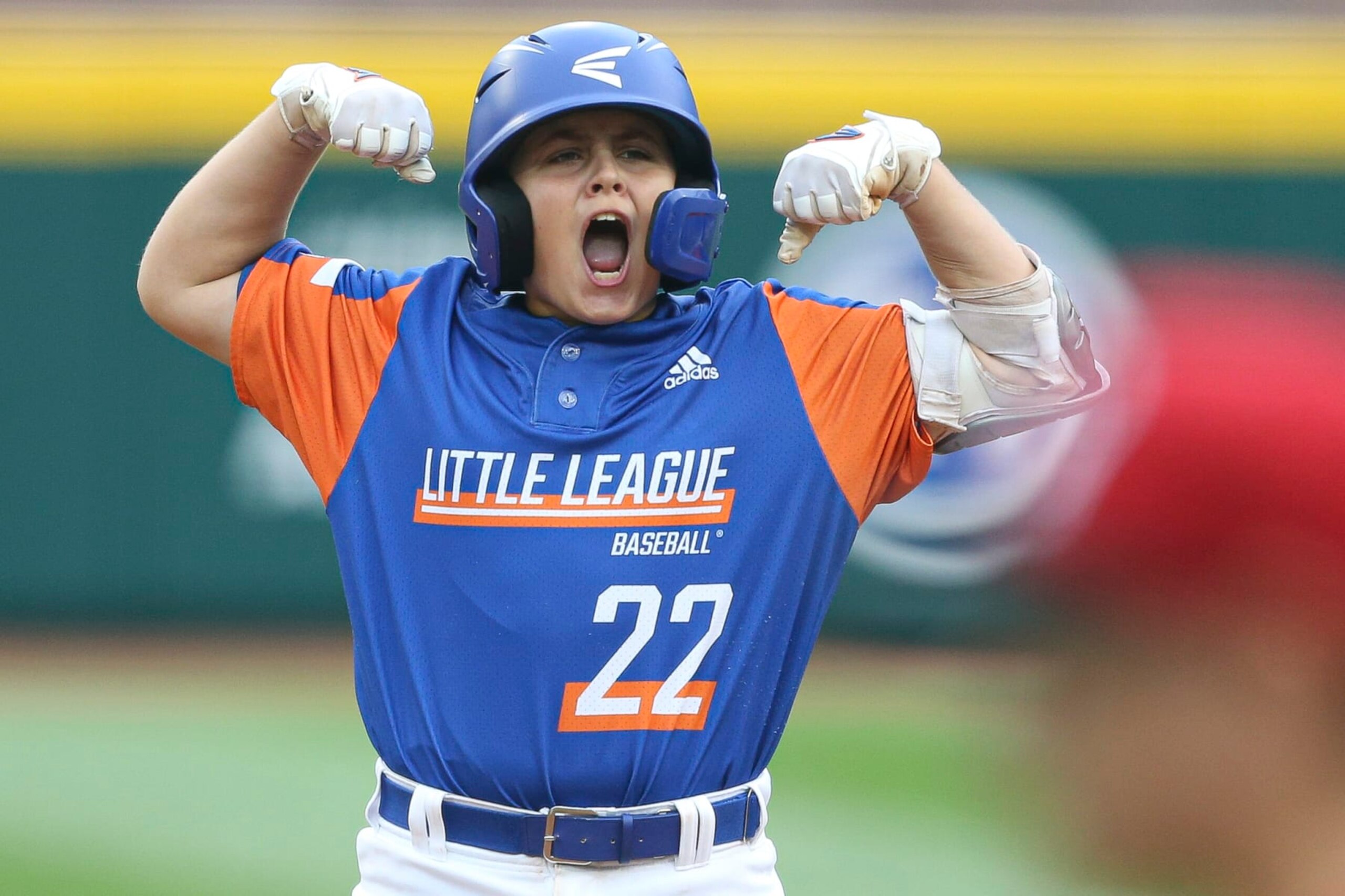 WILLIAMSPORT, PENNSYLVANIA - AUGUST 29: Jackson Surma #22 of Team Michigan celebrates hitting a two-run double in the fifth inning of the 2021 Little League World Series against Team Ohio at Howard J. Lamade Stadium on August 29, 2021 in Williamsport, Pennsylvania. (Photo by Joshua Bessex/Getty Images)