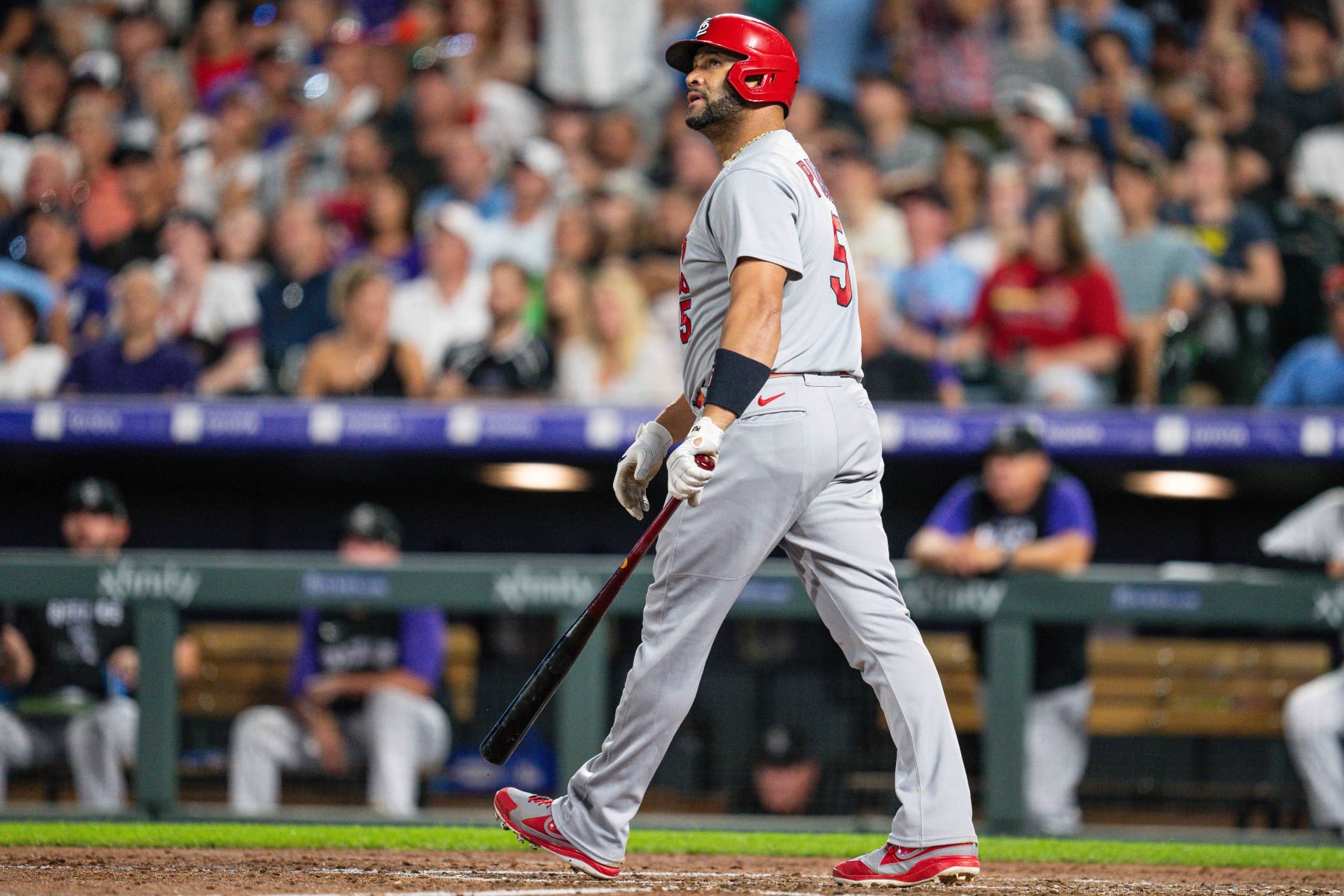 DENVER, COLORADO - AUGUST 10: Albert Pujols #5 of the St. Louis Cardinals hits career home run number 687 against the Colorado Rockies at Coors Field on August 10, 2022 in Denver, Colorado.(Photo by Harrison Barden/Colorado Rockies/Getty Images)