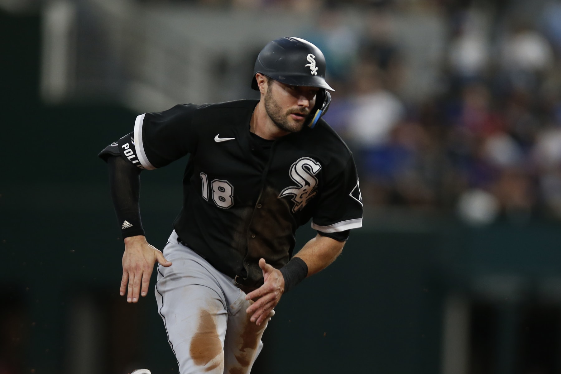 ARLINGTON, TEXAS - AUGUST 07: AJ Pollock #18 of the Chicago White Sox runs to second base after hitting a double in the fourth inning against the Texas Rangers at Globe Life Field on August 07, 2022 in Arlington, Texas. (Photo by Tim Heitman/Getty Images)