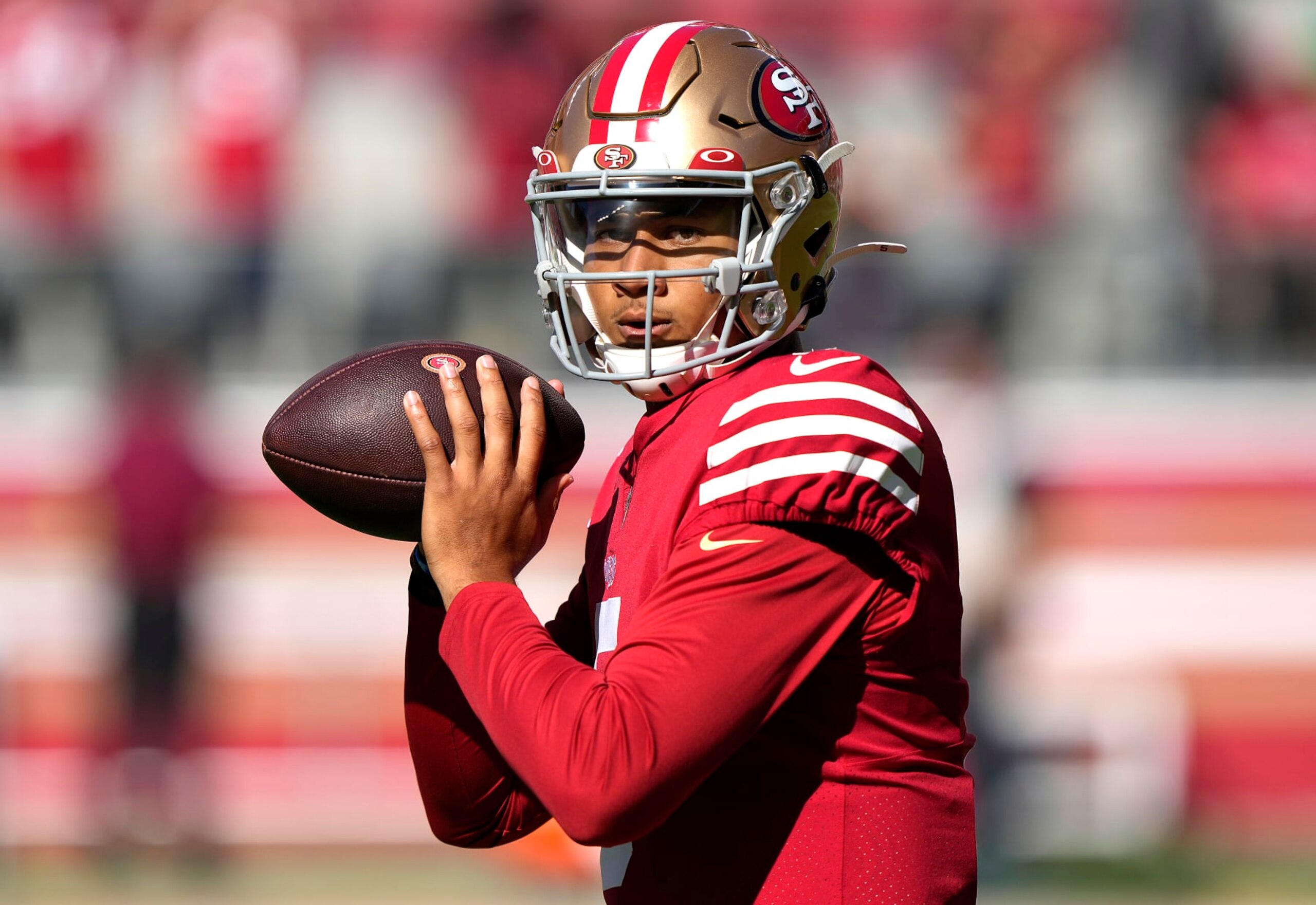 SANTA CLARA, CALIFORNIA - AUGUST 12: Trey Lance #5 of the San Francisco 49ers warms up prior to the start of a preseason NFL game against the Green Bay Packers at Levi's Stadium on August 12, 2022 in Santa Clara, California. (Photo by Thearon W. Henderson/Getty Images)